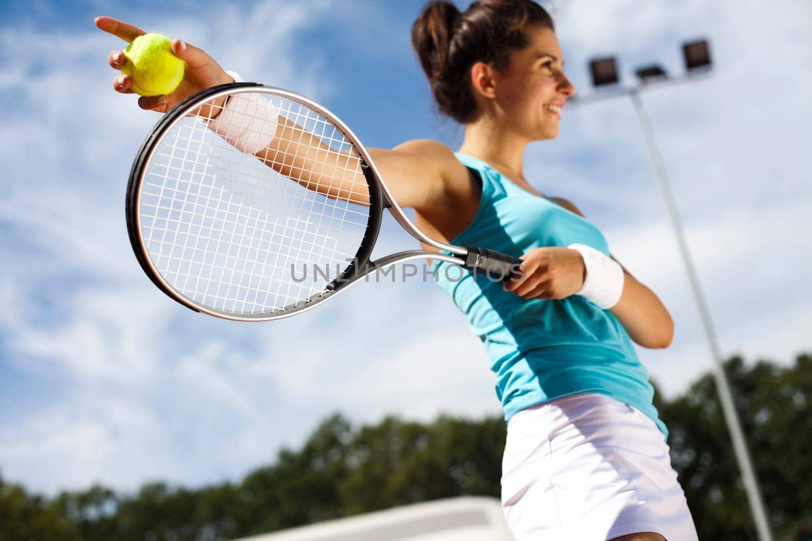 Young woman playing tennis