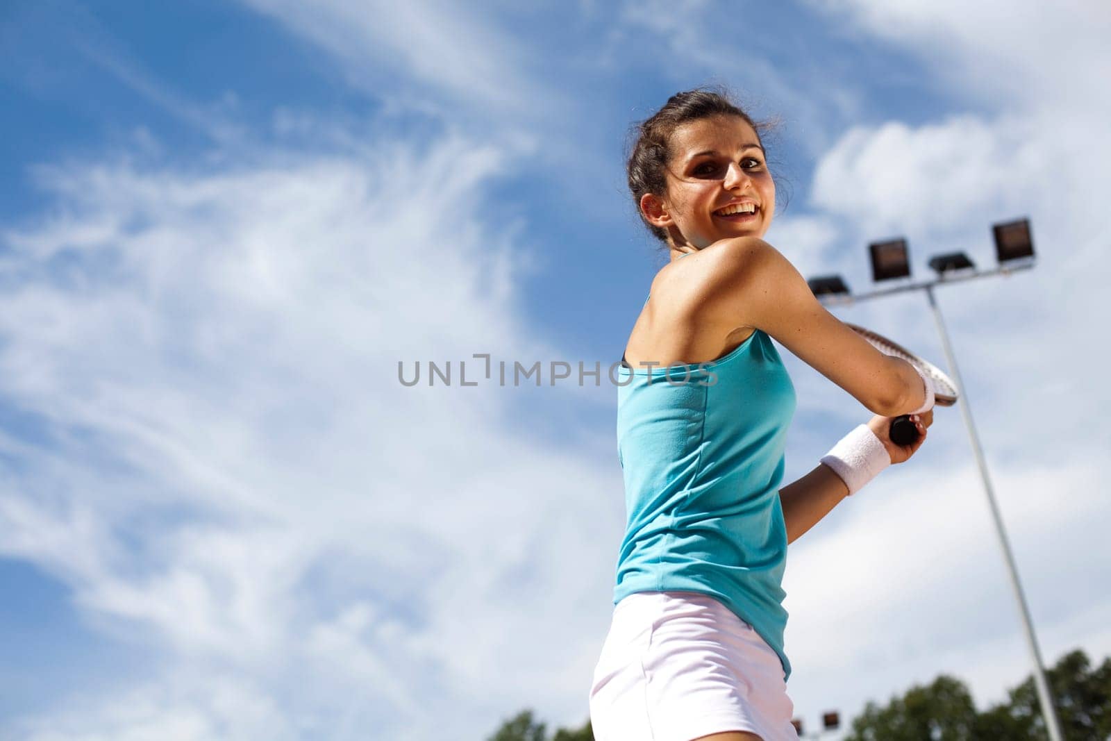 Girl playing tennis