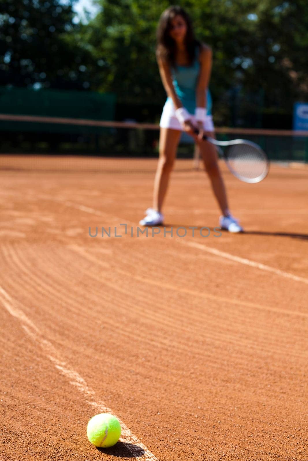 Young woman playing tennis