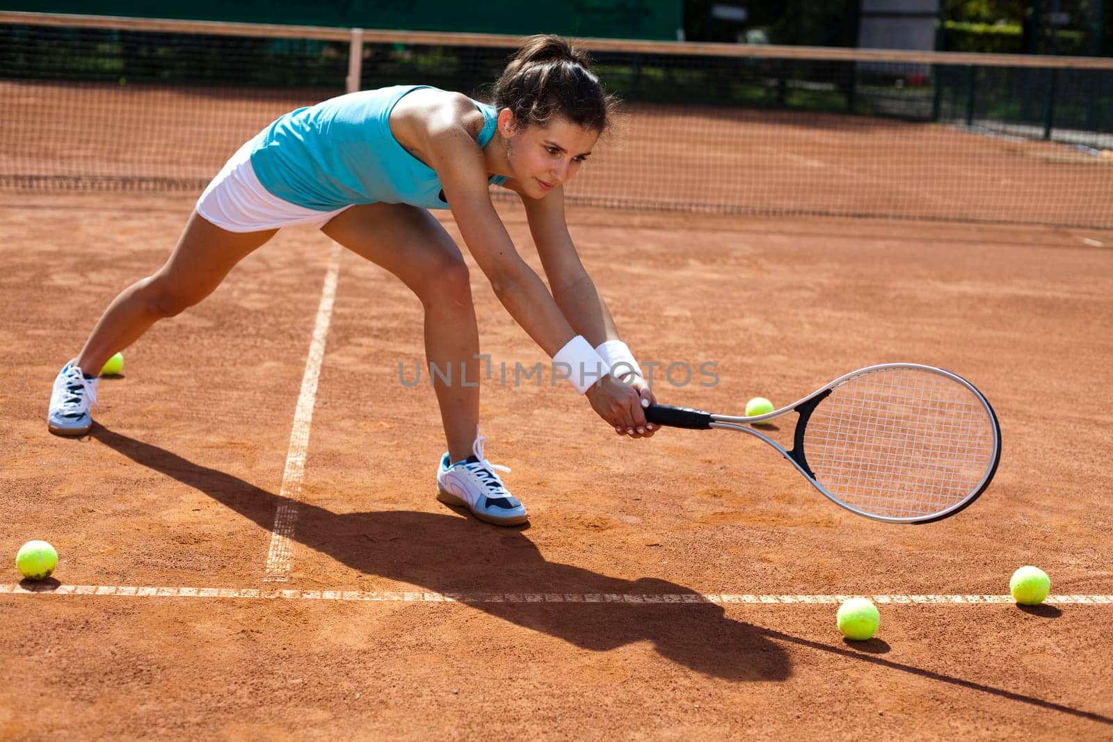 Young woman playing tennis