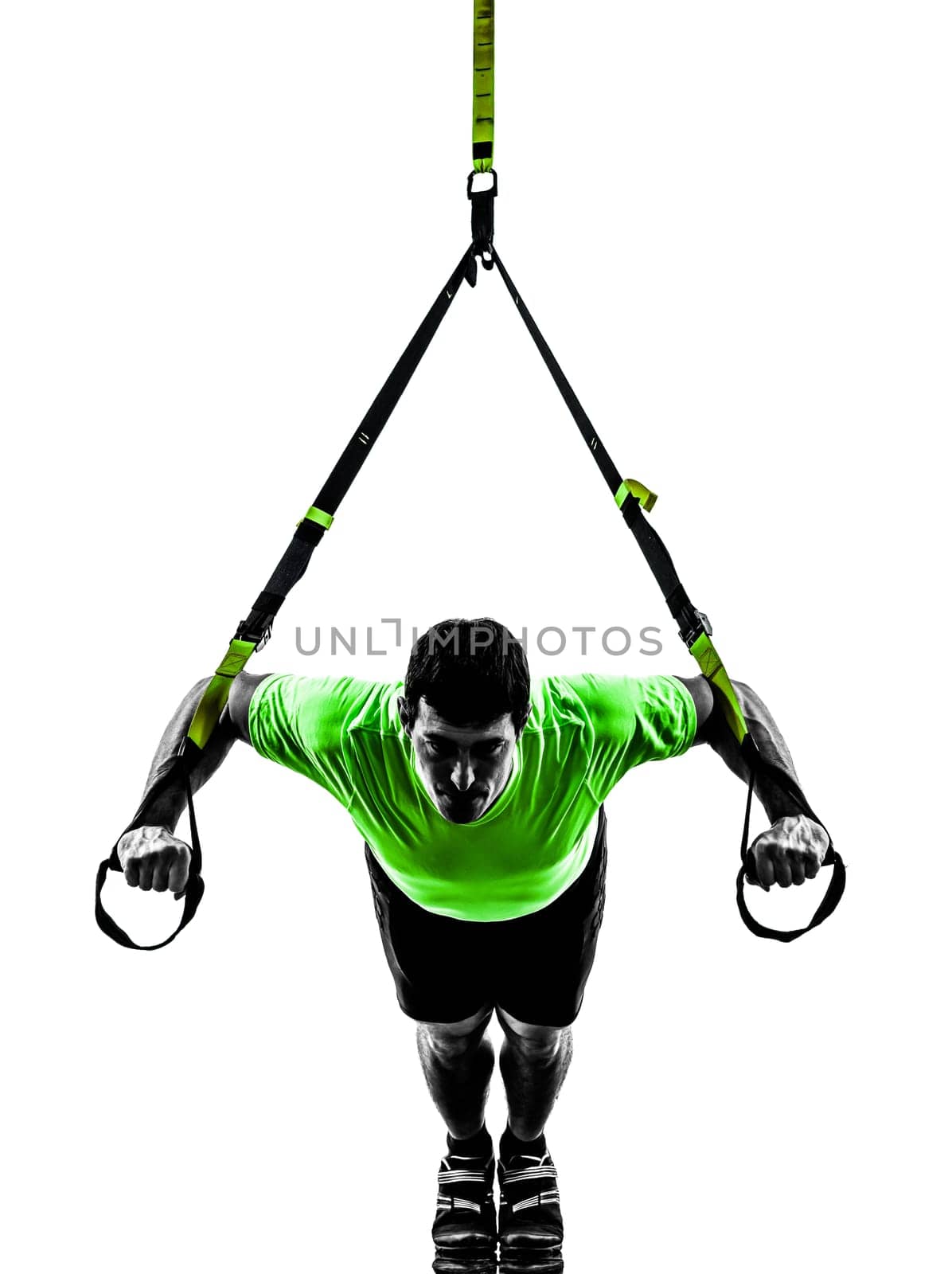 one caucasian man exercising   suspension training  trx   on white background