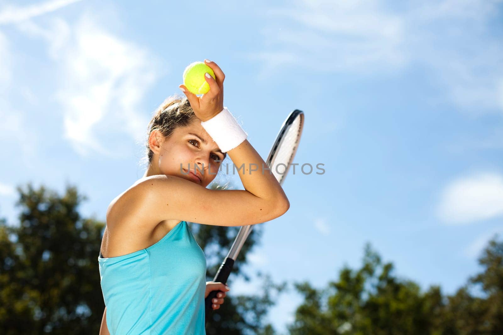 Young woman playing tennis