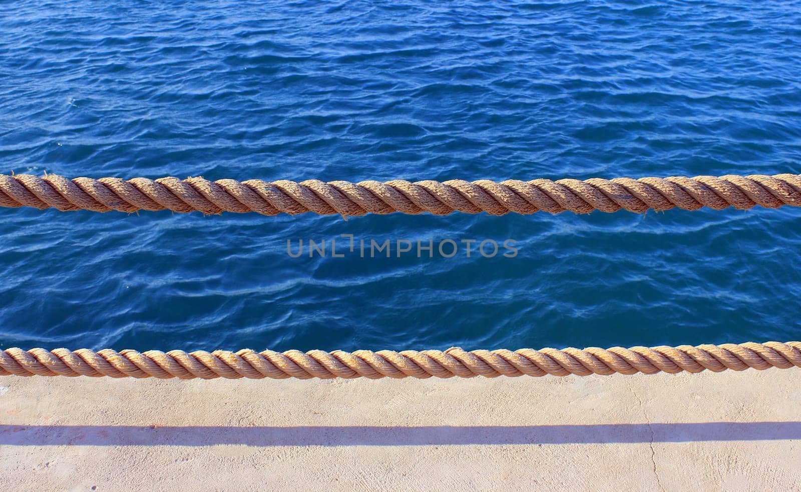 sea wharf at sun light