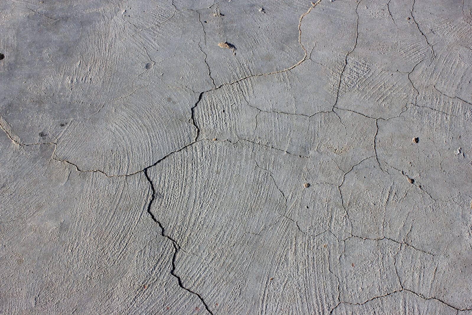 Grunge concrete cement wall with crack in industrial building