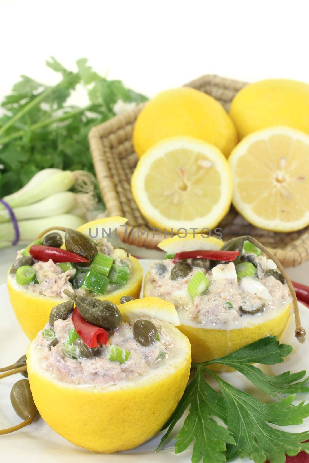 lemons stuffed with tuna cream and capers