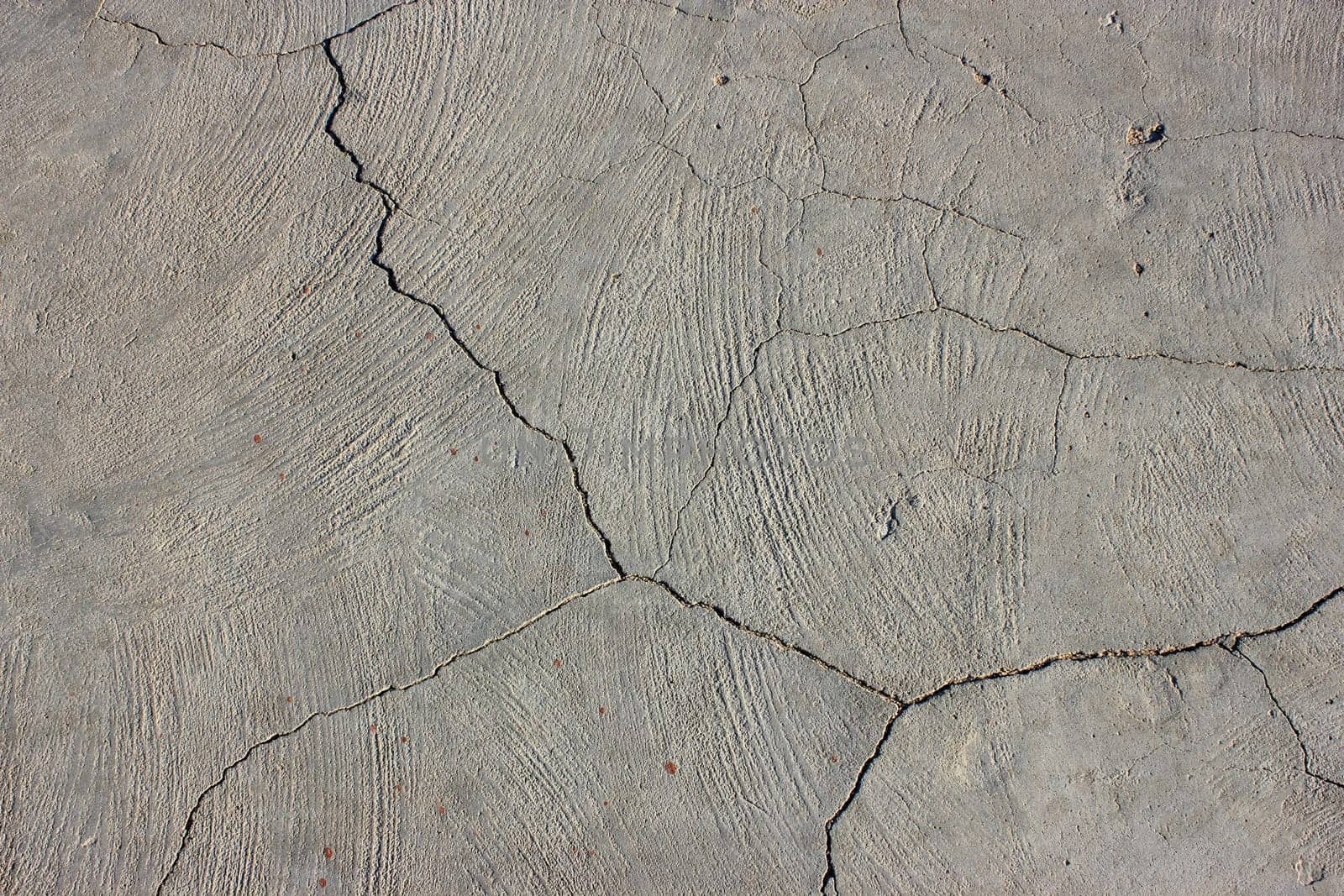 Grunge concrete cement wall with crack in industrial building
