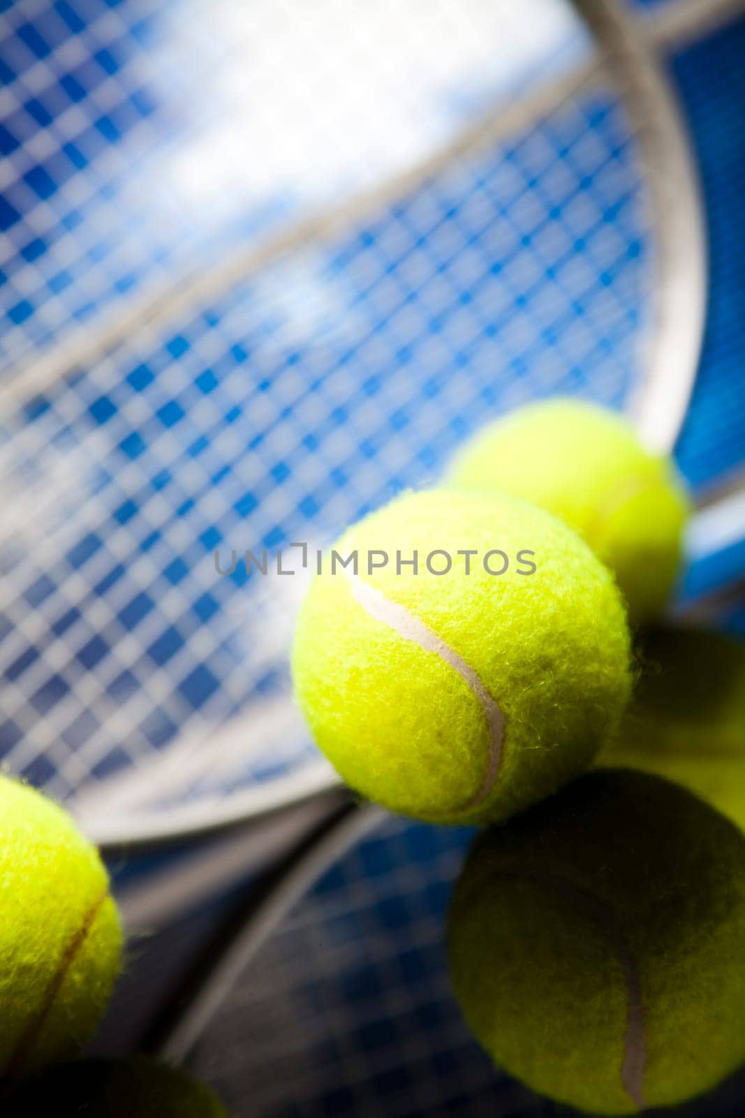Tennis racket and balls