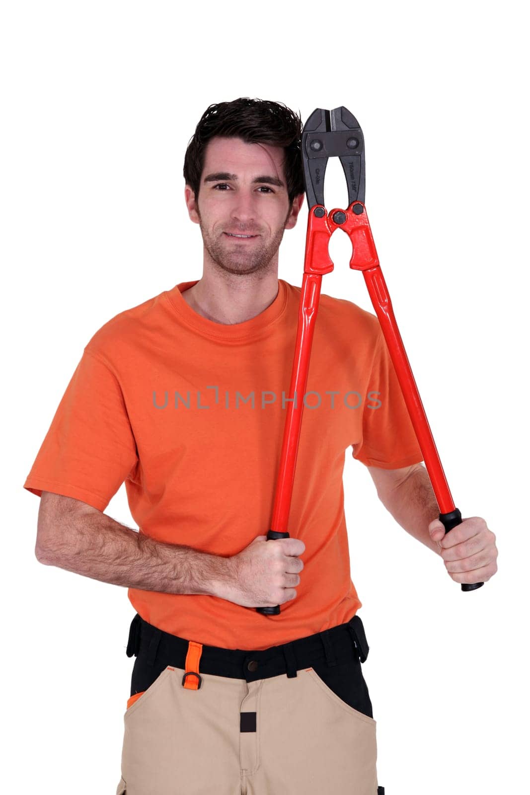craftsman holding an enormous pair of pliers