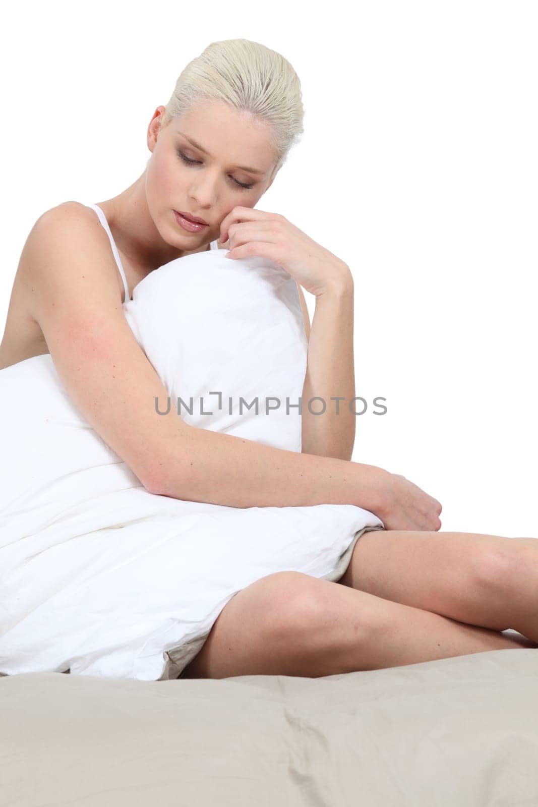 Woman hugging her pillow