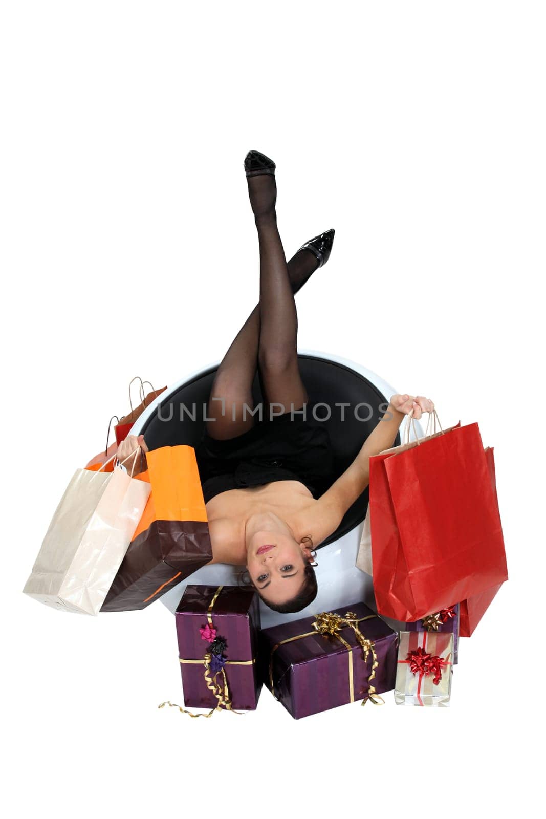 Woman with shopping bags and presents