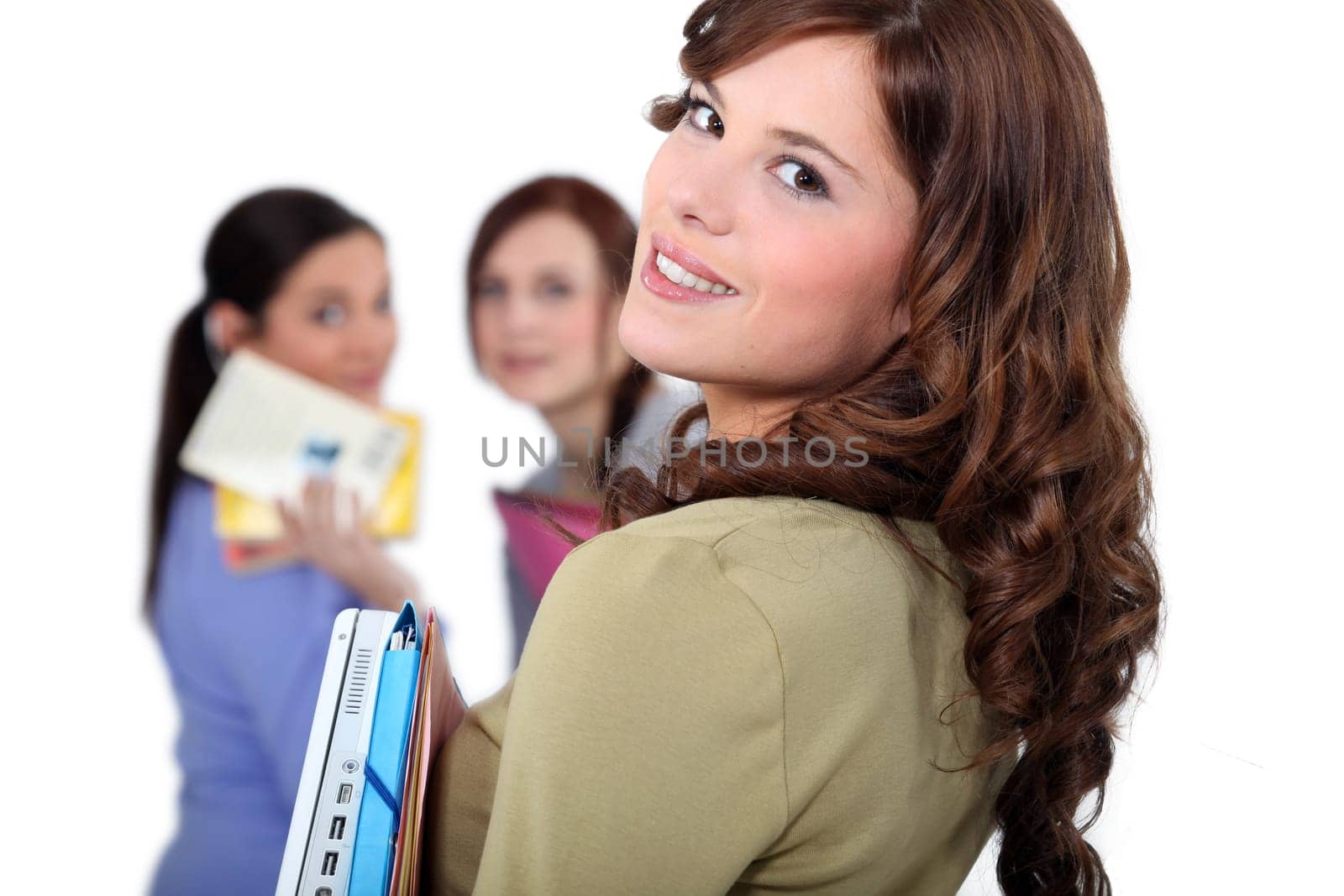 Young woman meeting up with her friends at school