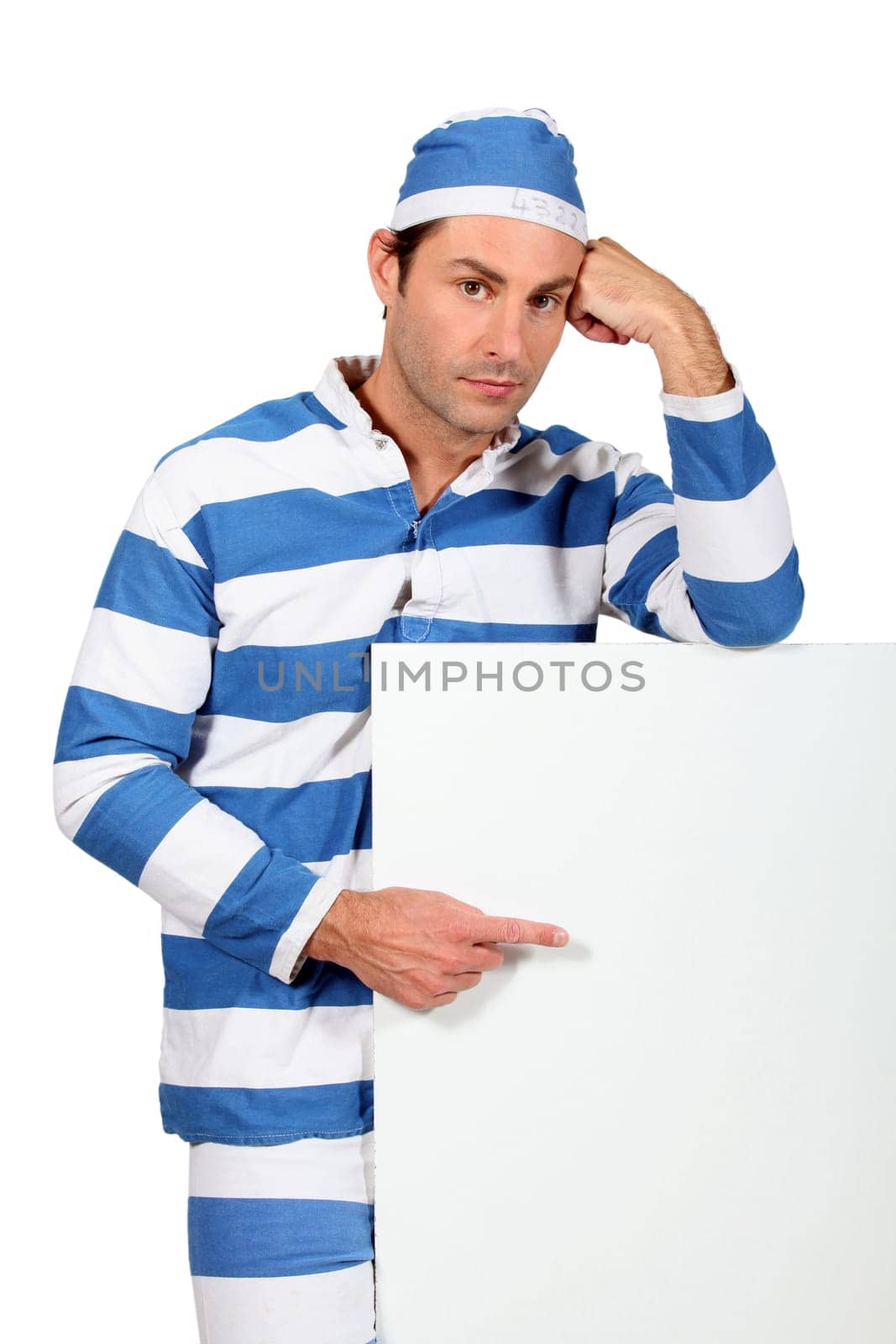 Prisoner pointing at white board