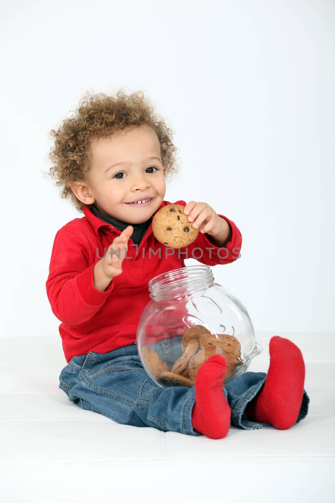 Boy eating biscuits