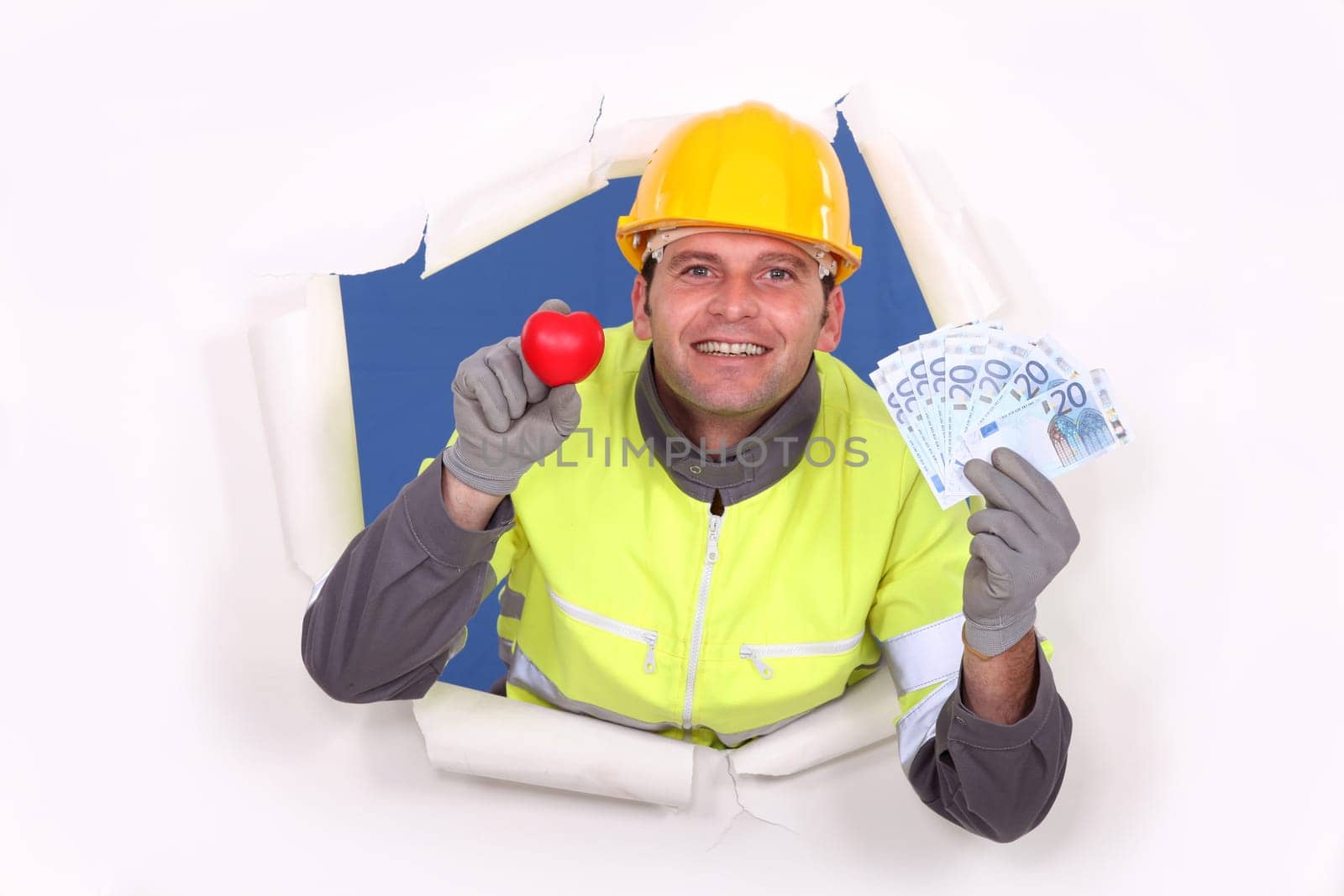 A construction worker showing his cash.