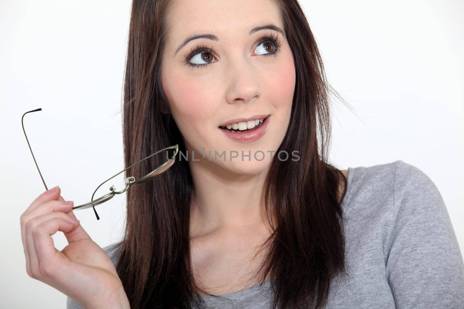 Brunette with glasses in hand