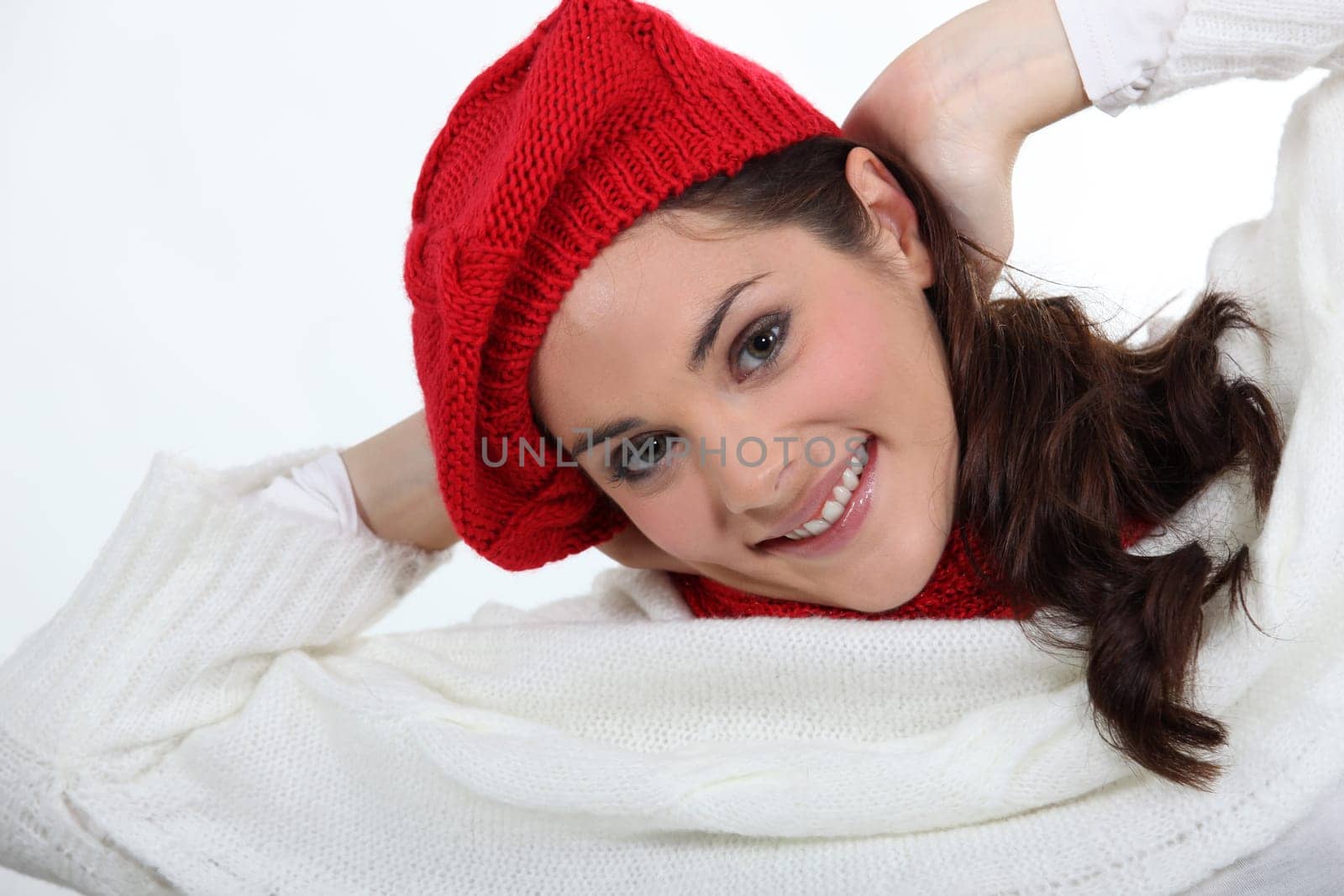 portrait of young woman wearing woolen hat