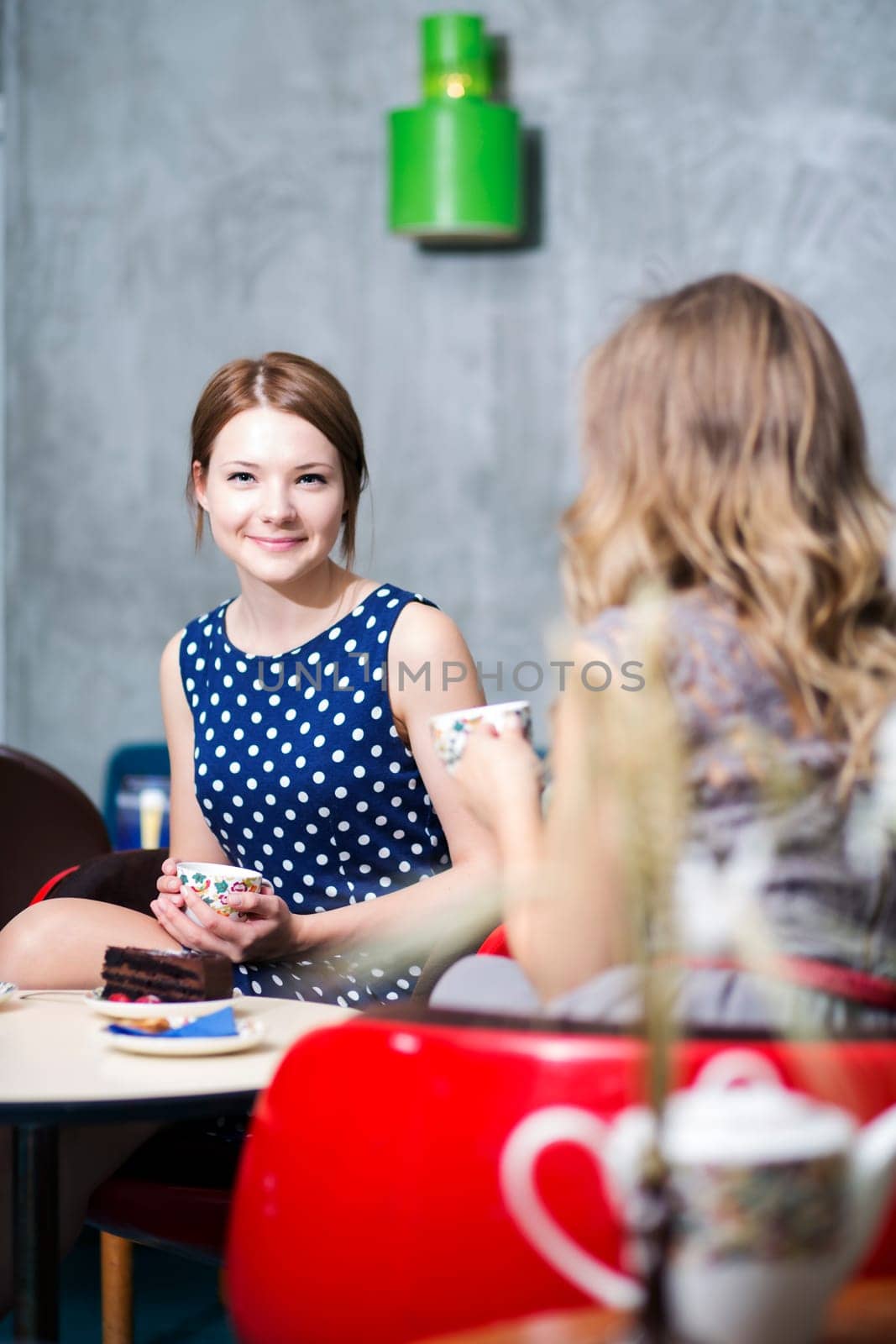 Woman smile in café when seen somethink funny