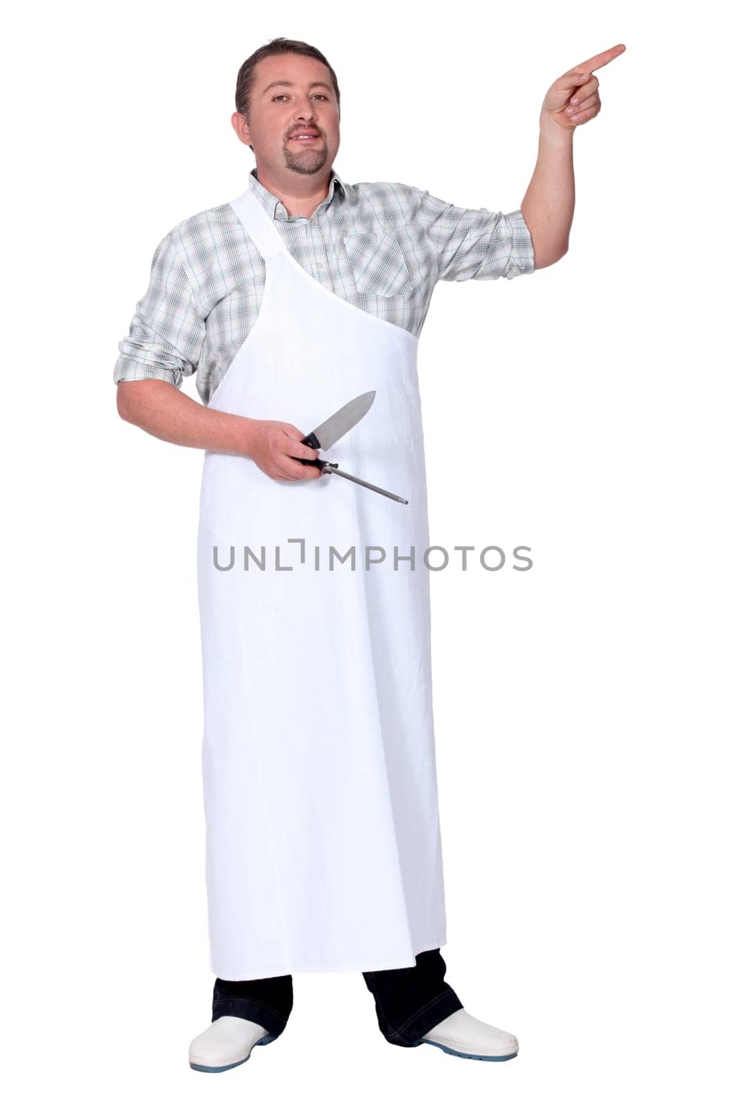 Male chef holding knife and pointing