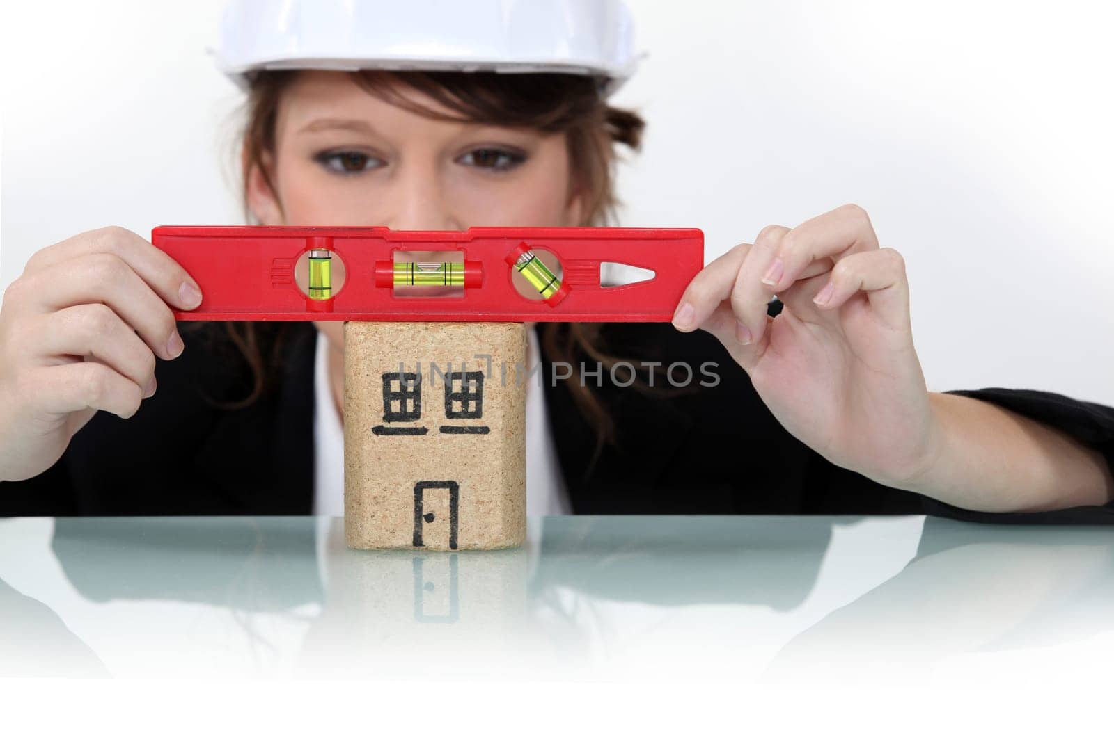 Woman using spirit level