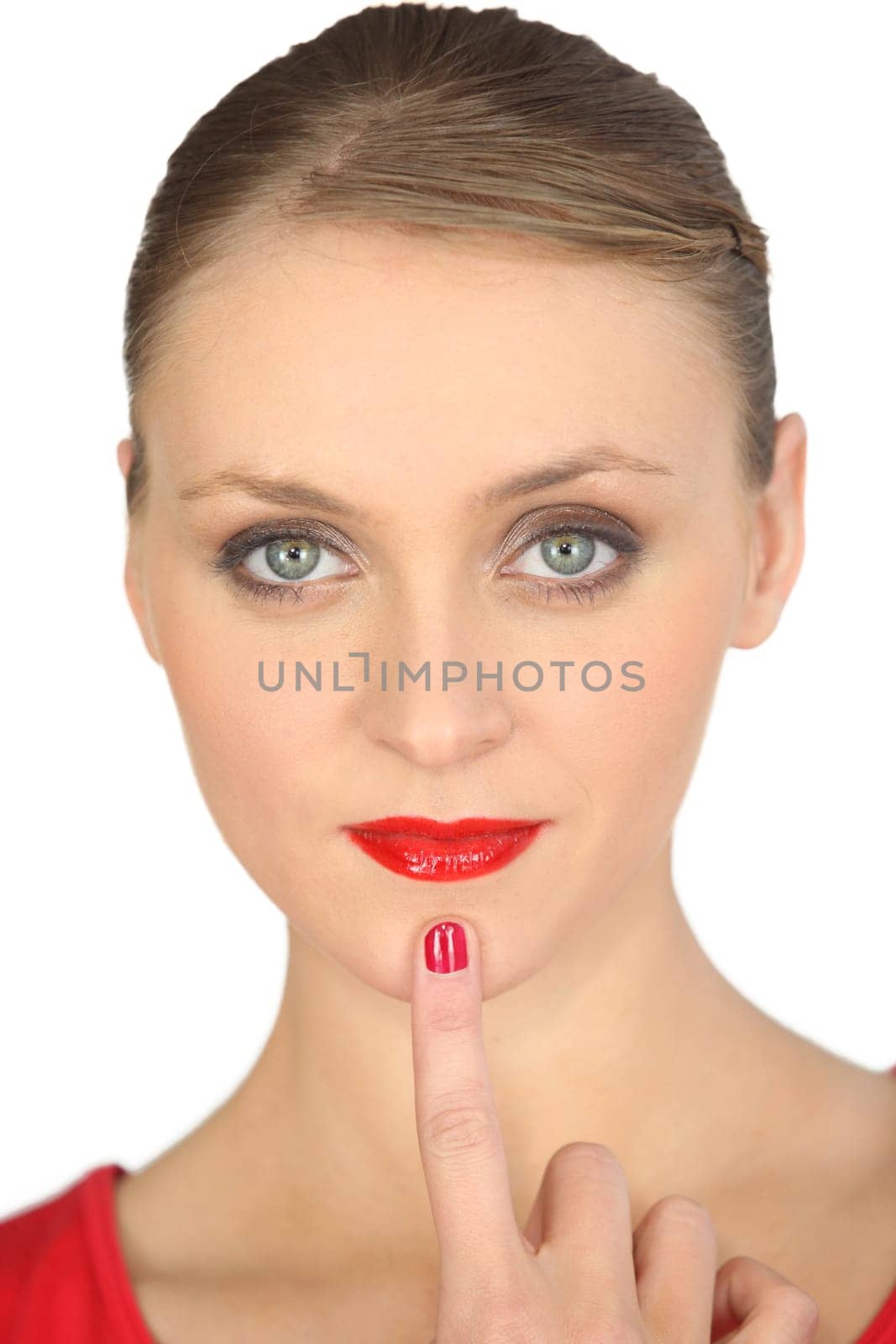 woman with red lipstick and red polished nails