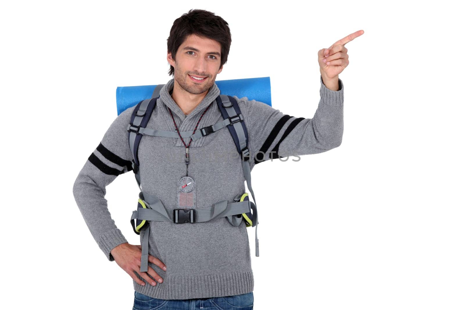 portrait of a young man with camping gear