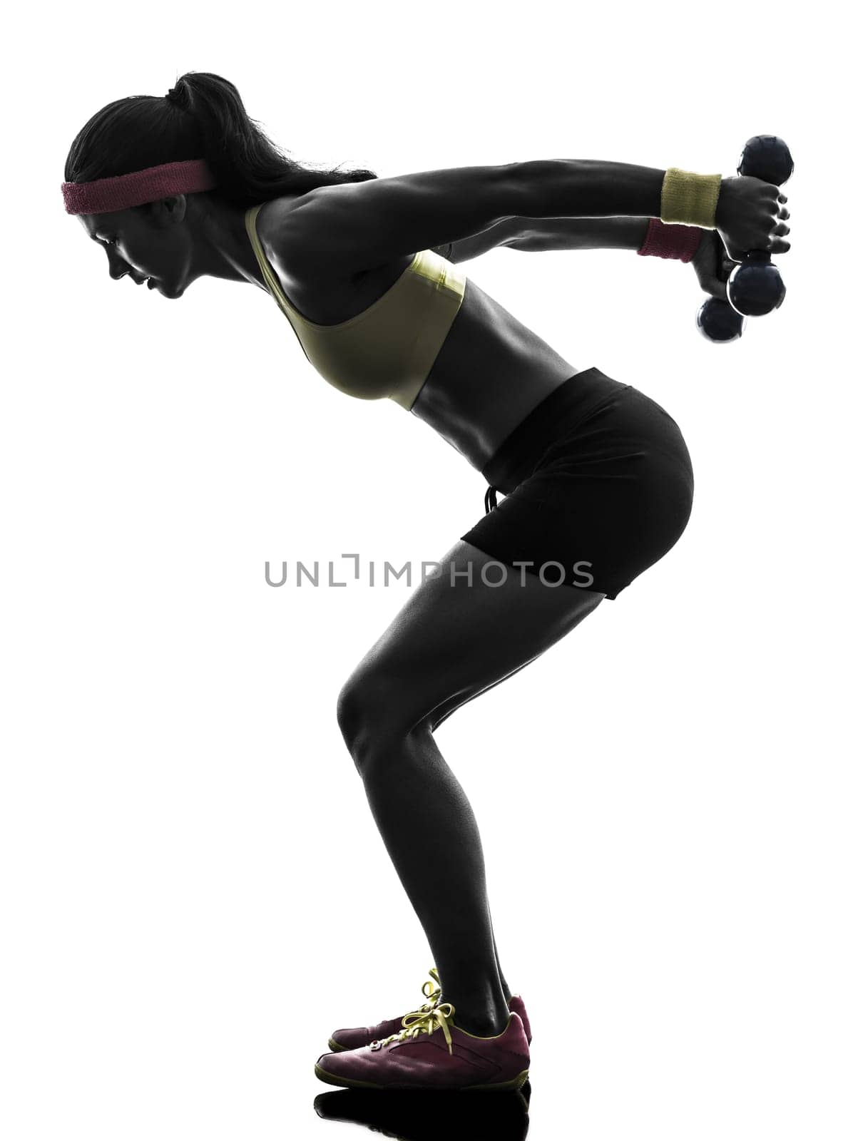 one  woman exercising fitness workout weight training in silhouette  on white background