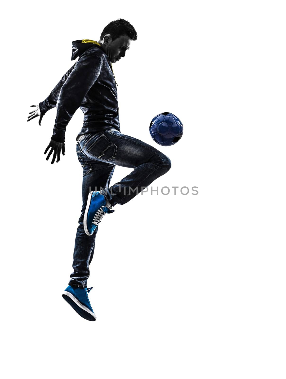 one caucasian young man soccer freestyler player  in silhouette  on white background