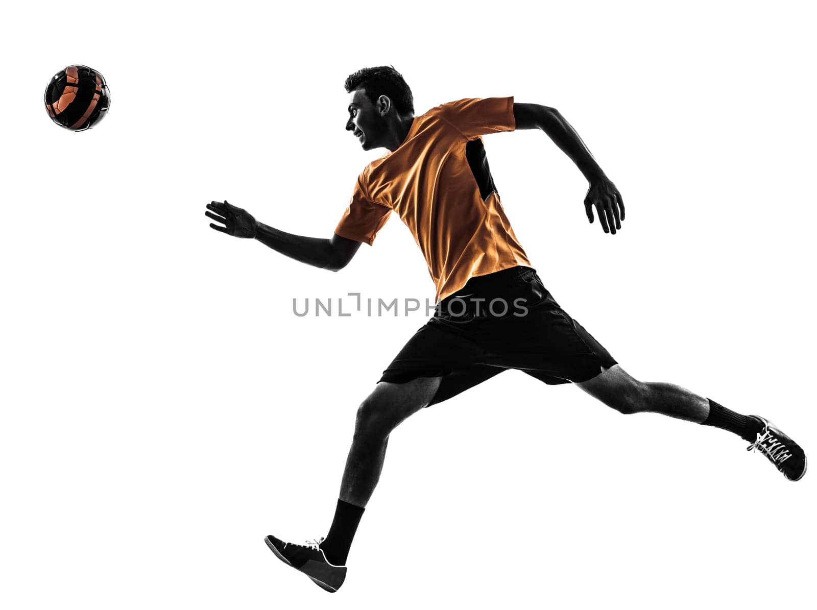 one caucasian young man soccer player orange jersey in silhouette  on white background