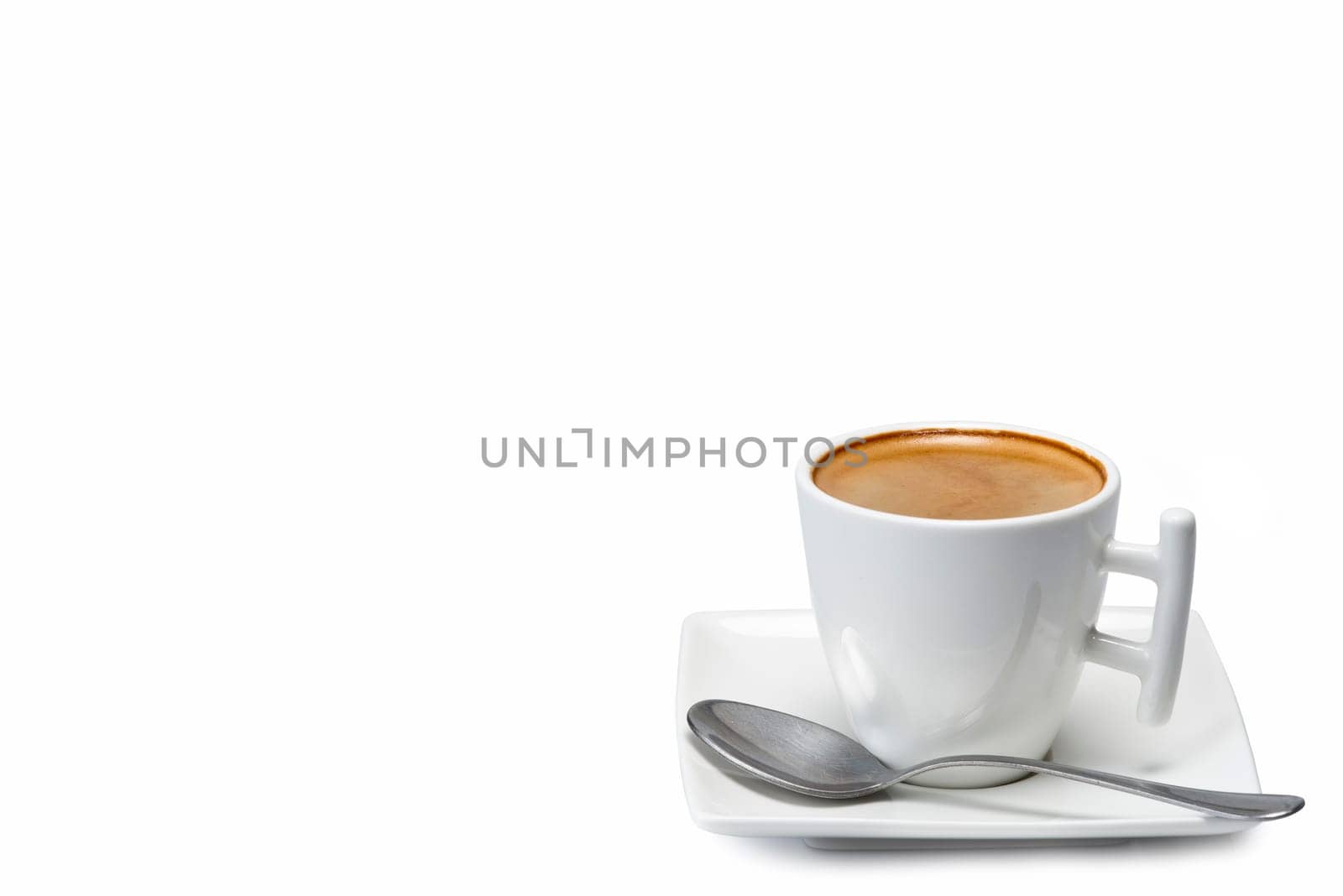 Espresso in a modern cup and a square saucer isolated over a white background.