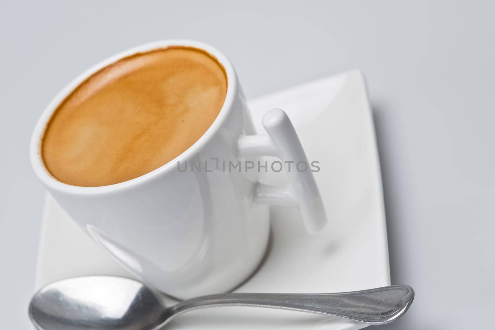 Closeup from a coffee over a white background.