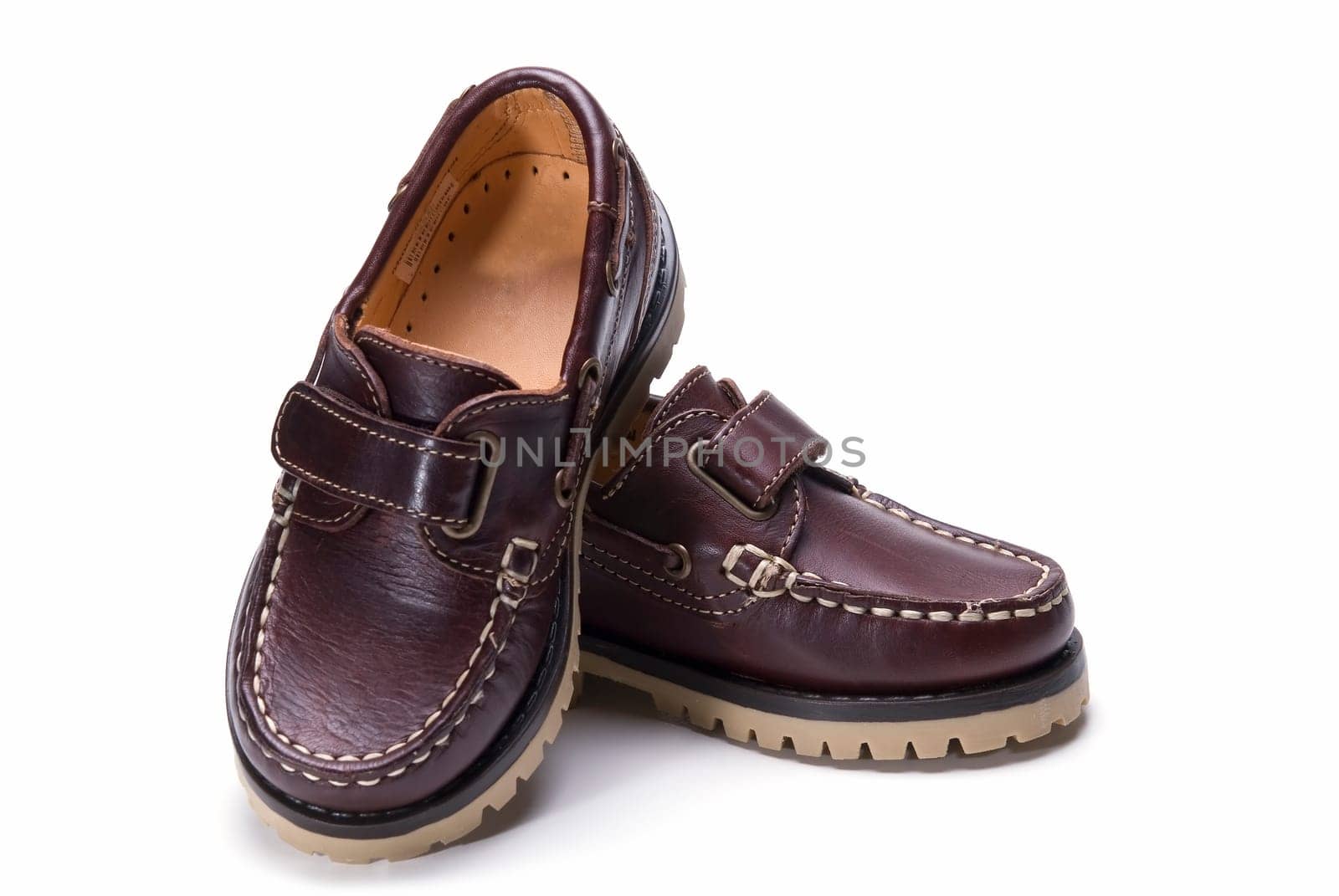 Shoes for kids isolated over a white background.