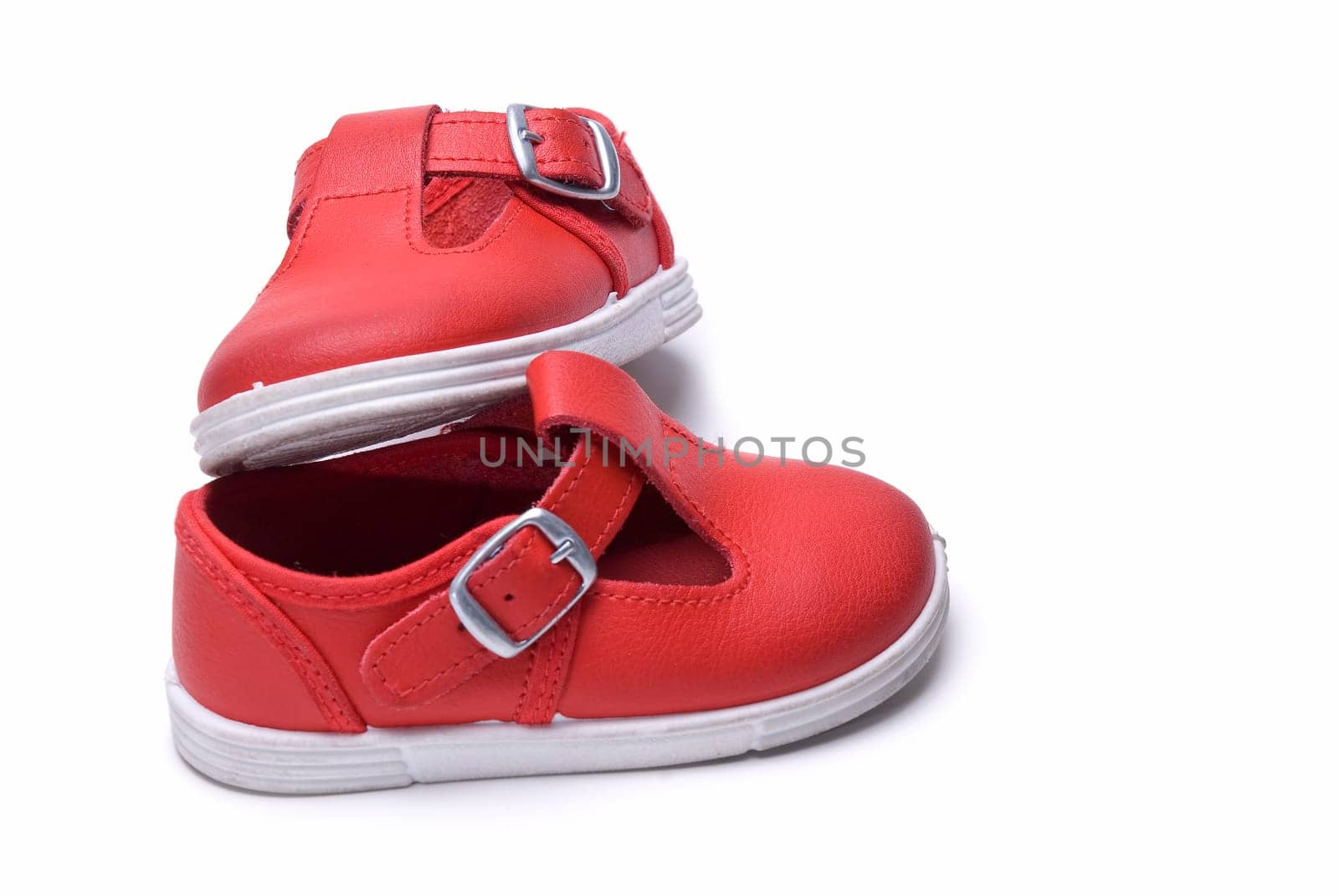 Shoes for kids isolated over a white background.