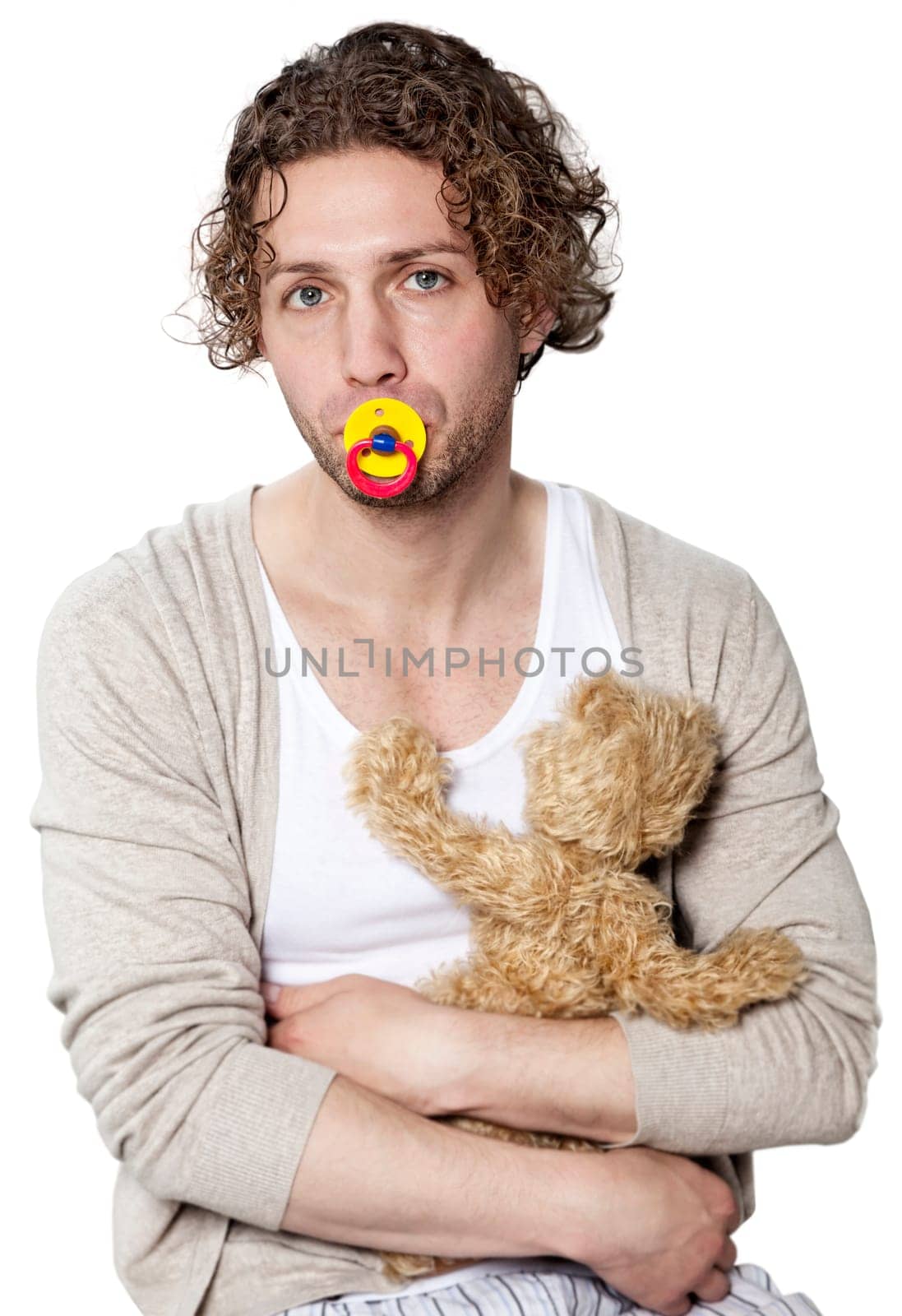 Portrait of a young man with a pacifier and teddy bear,isolated on white