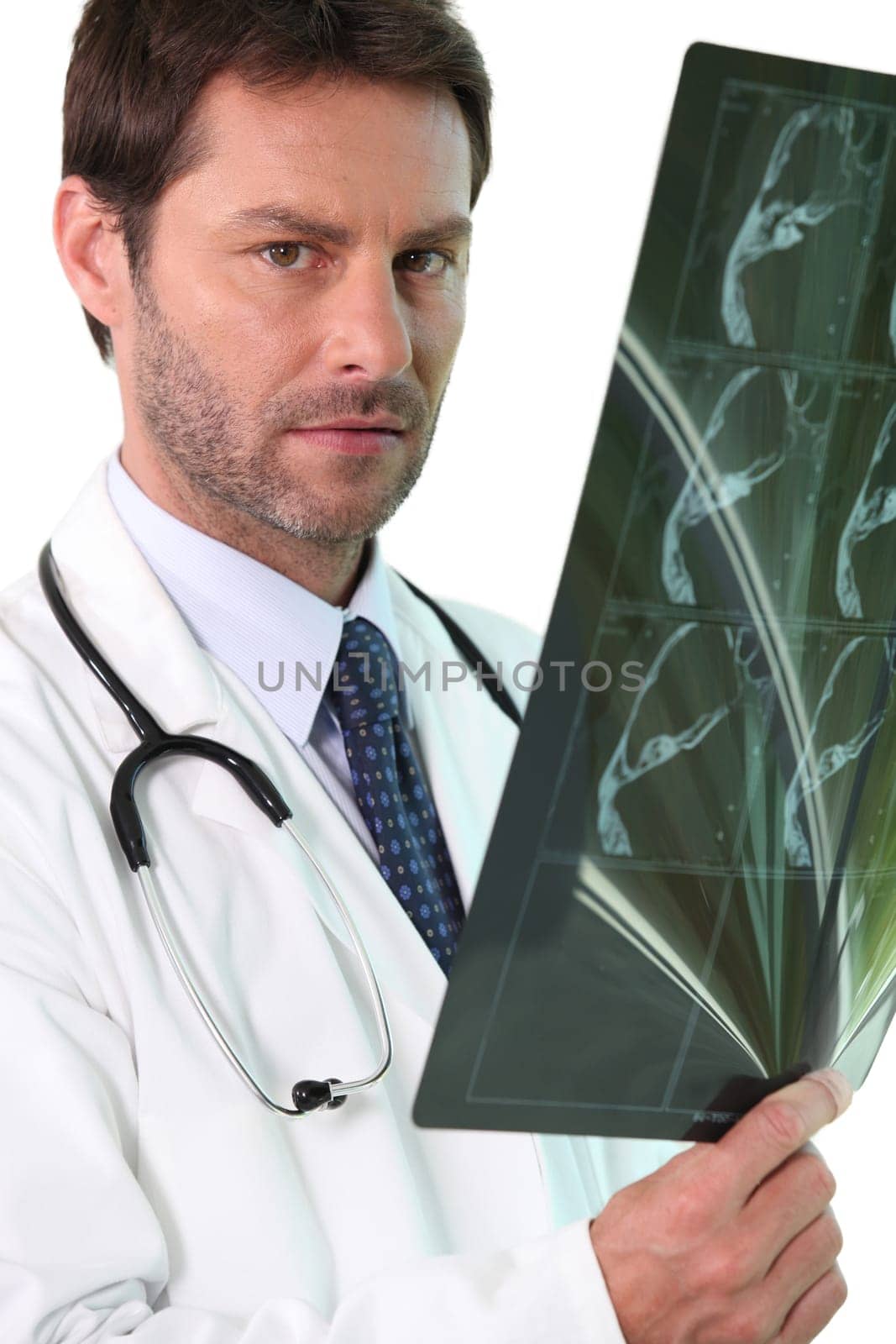 Doctor examining an x-ray