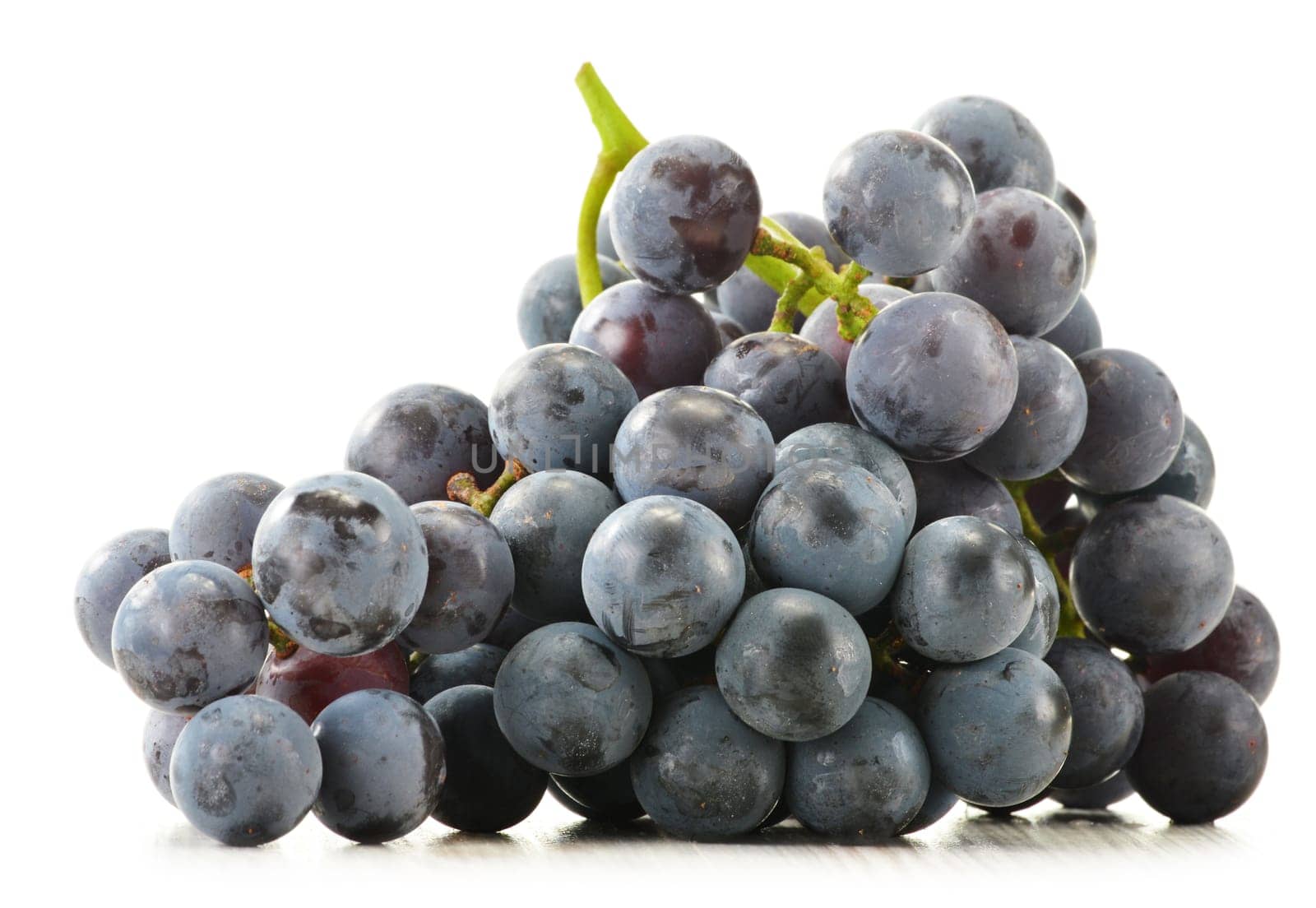 Bunch of fresh red grapes isolated on white
