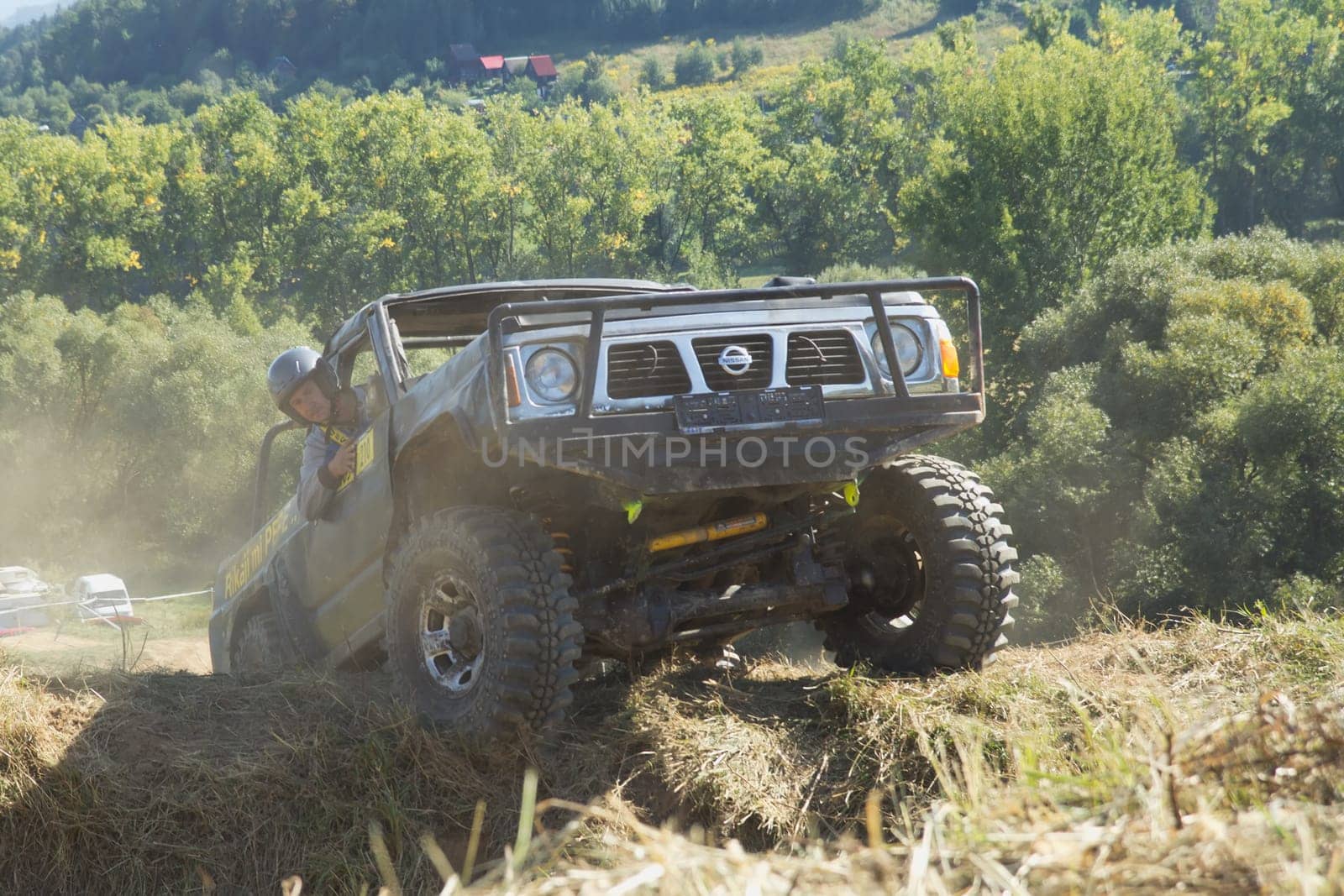 RAPOTIN, CZECH REPUBLIC - SEPT 07. Off-road cars on a trial race in the "BIG SHOCK CUP Trial 2013"" on September 07, 2013 near the village Rapotin, Czech Republic."