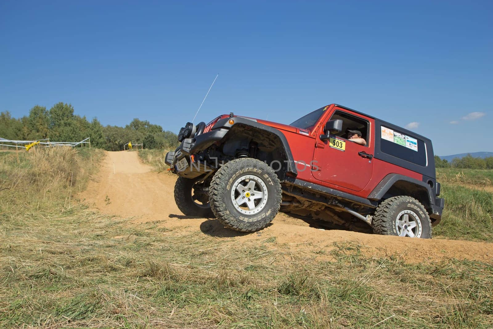 RAPOTIN, CZECH REPUBLIC - SEPT 07. Off-road cars on a trial race in the "BIG SHOCK CUP Trial 2013"" on September 07, 2013 near the village Rapotin, Czech Republic."