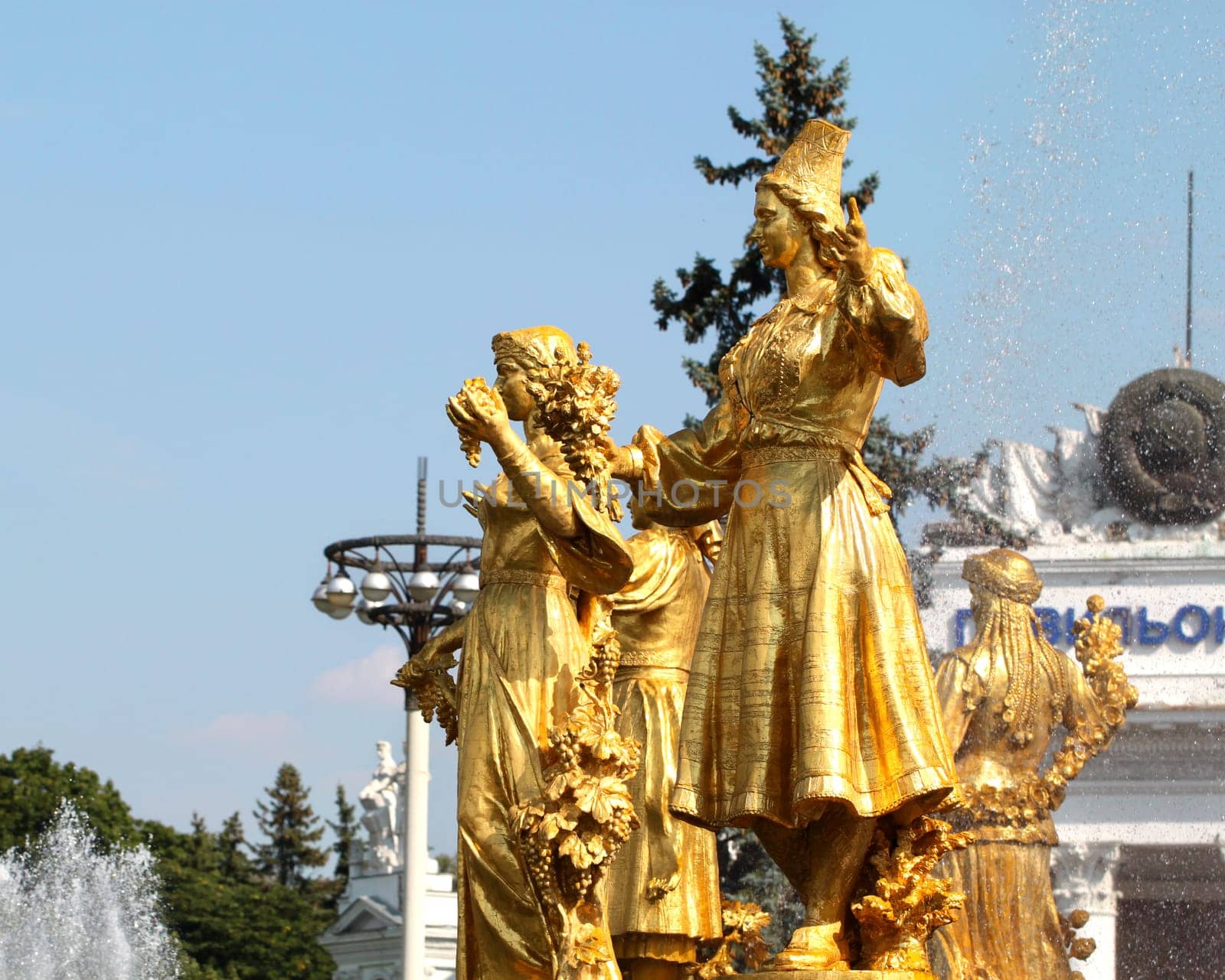 Girls with a fountain of friendship of the peoples of Armenia and Estonia