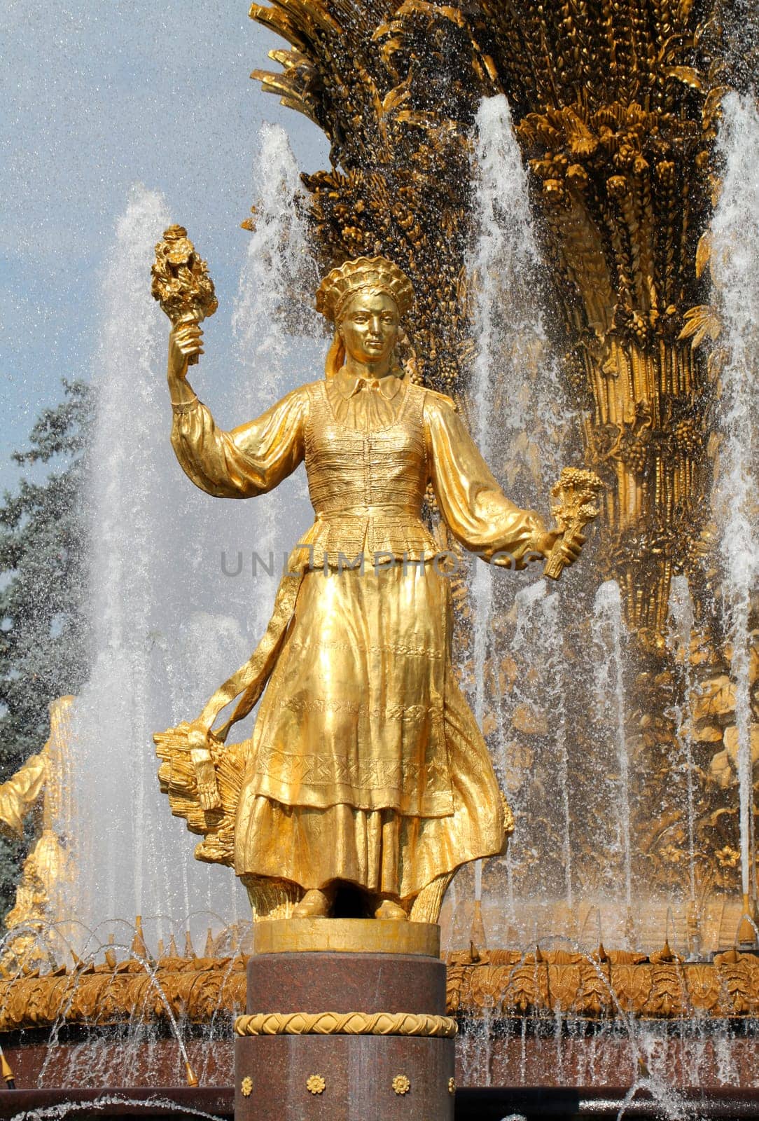 Girl with a fountain of friendship of peoples Lithuania in Moscow at ENEA