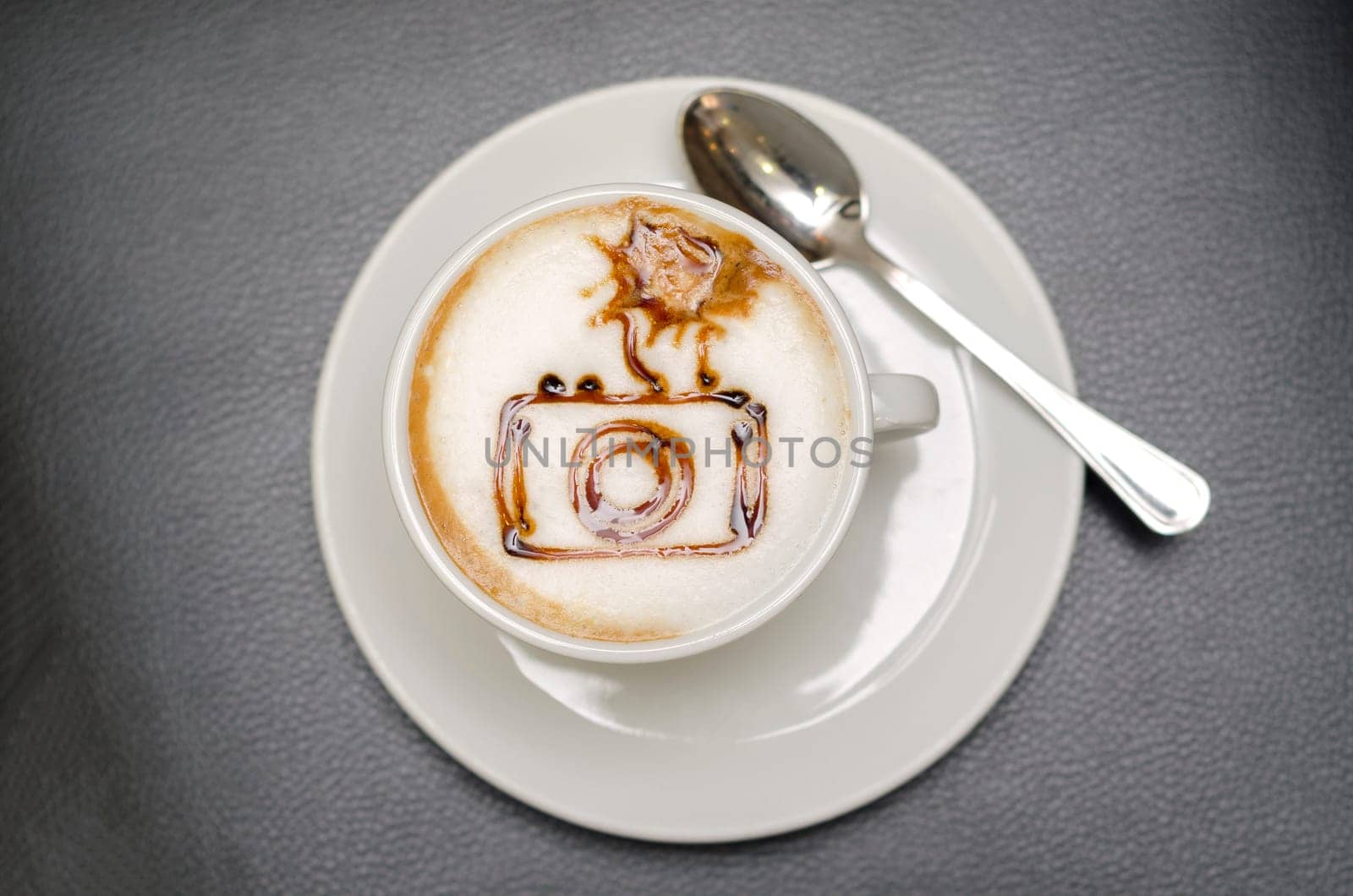 coffee decorated with a camera with flash