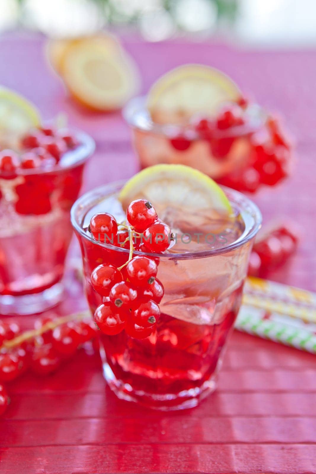 Fresh lemonade with fresh red currants and ice cream