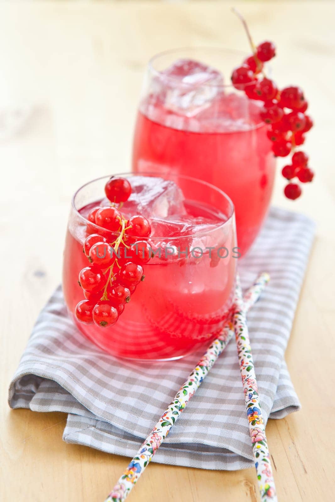 Cold bowl in two glasses with fresh red currants