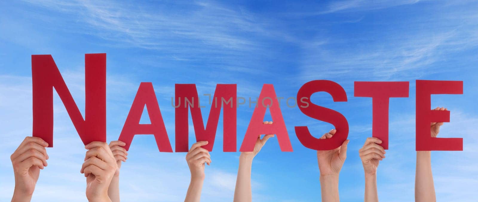 hands holding namaste