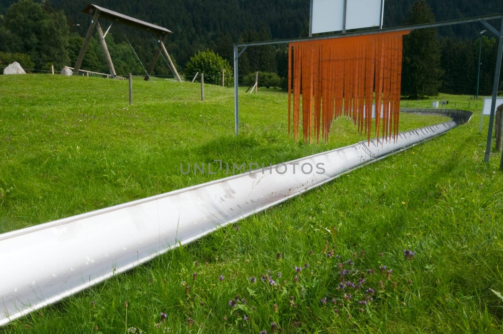 Oblique view of the run-out track of a summer toboggan run in the Allgäu (near Füssen)