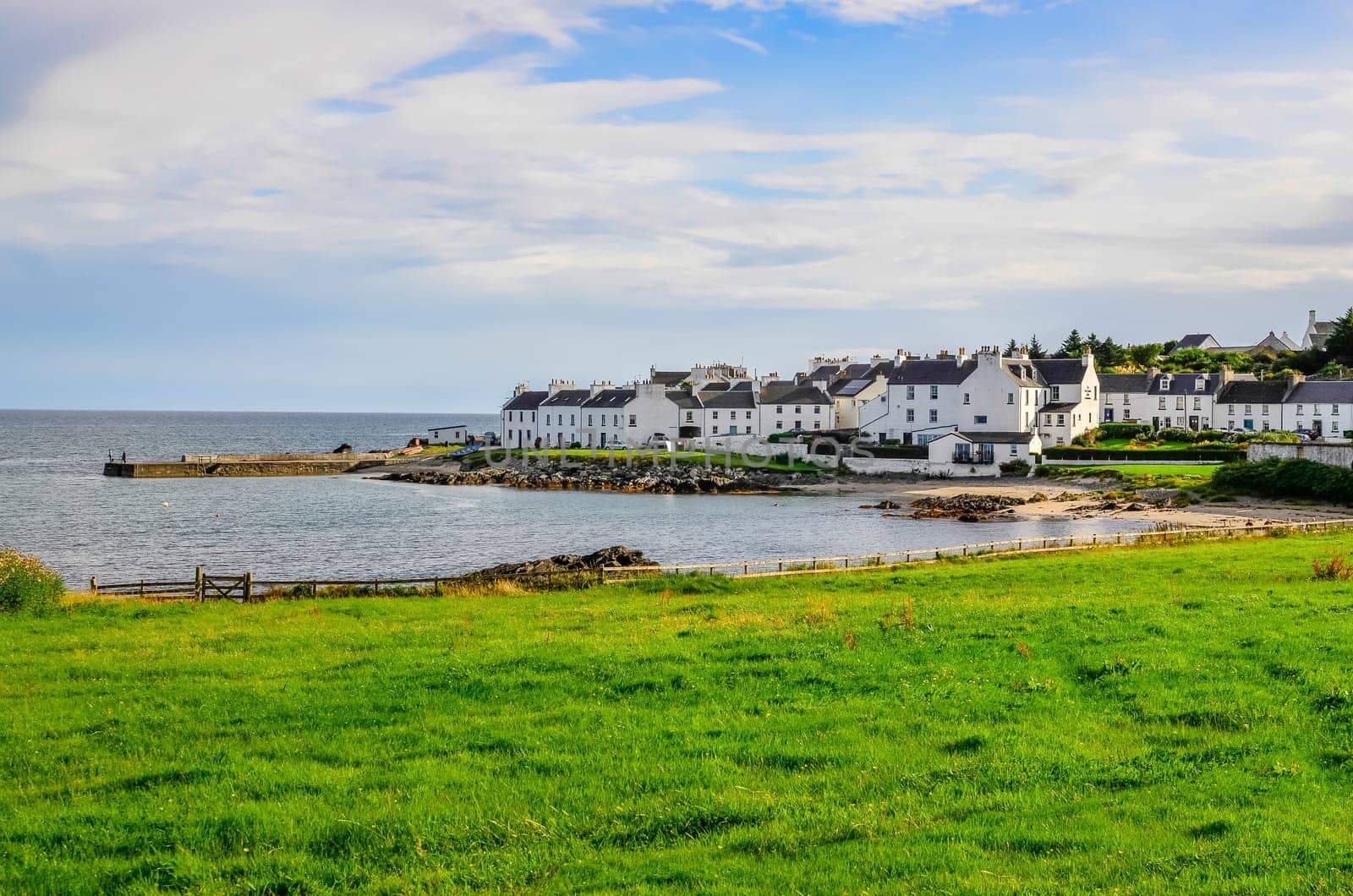 View of harbour and town Port Charlotte on Isle of Islay, Scotland