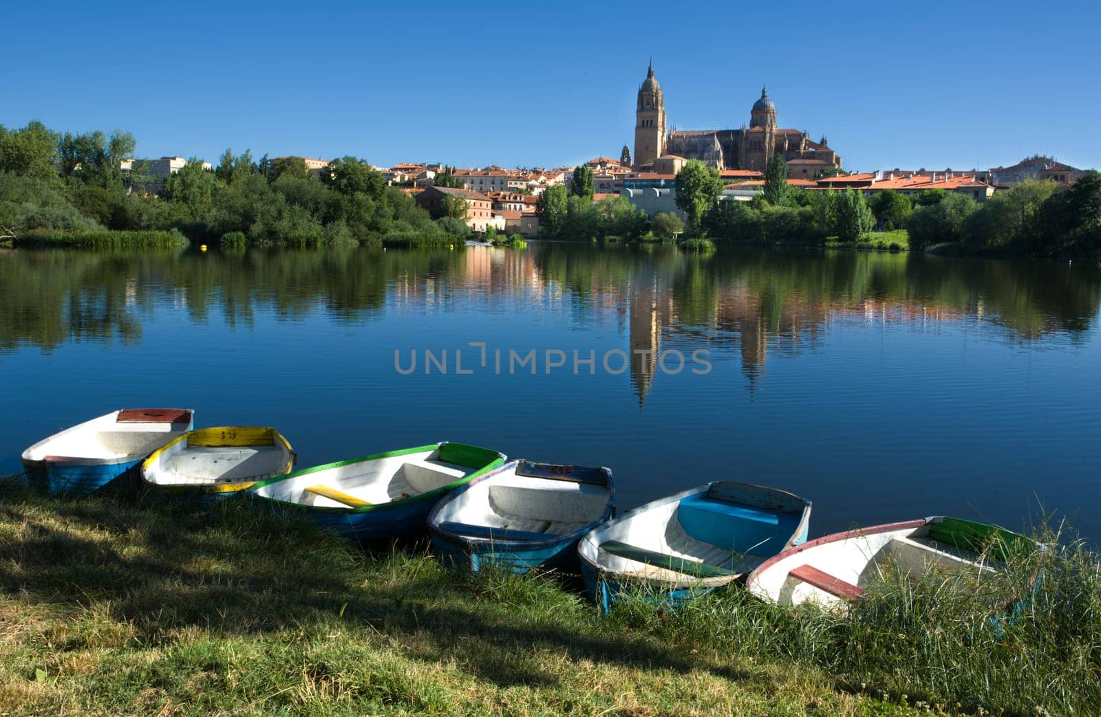 Dock of rawboats at Tormes river, in front of Salamanca of the Cathedral of Salamanca