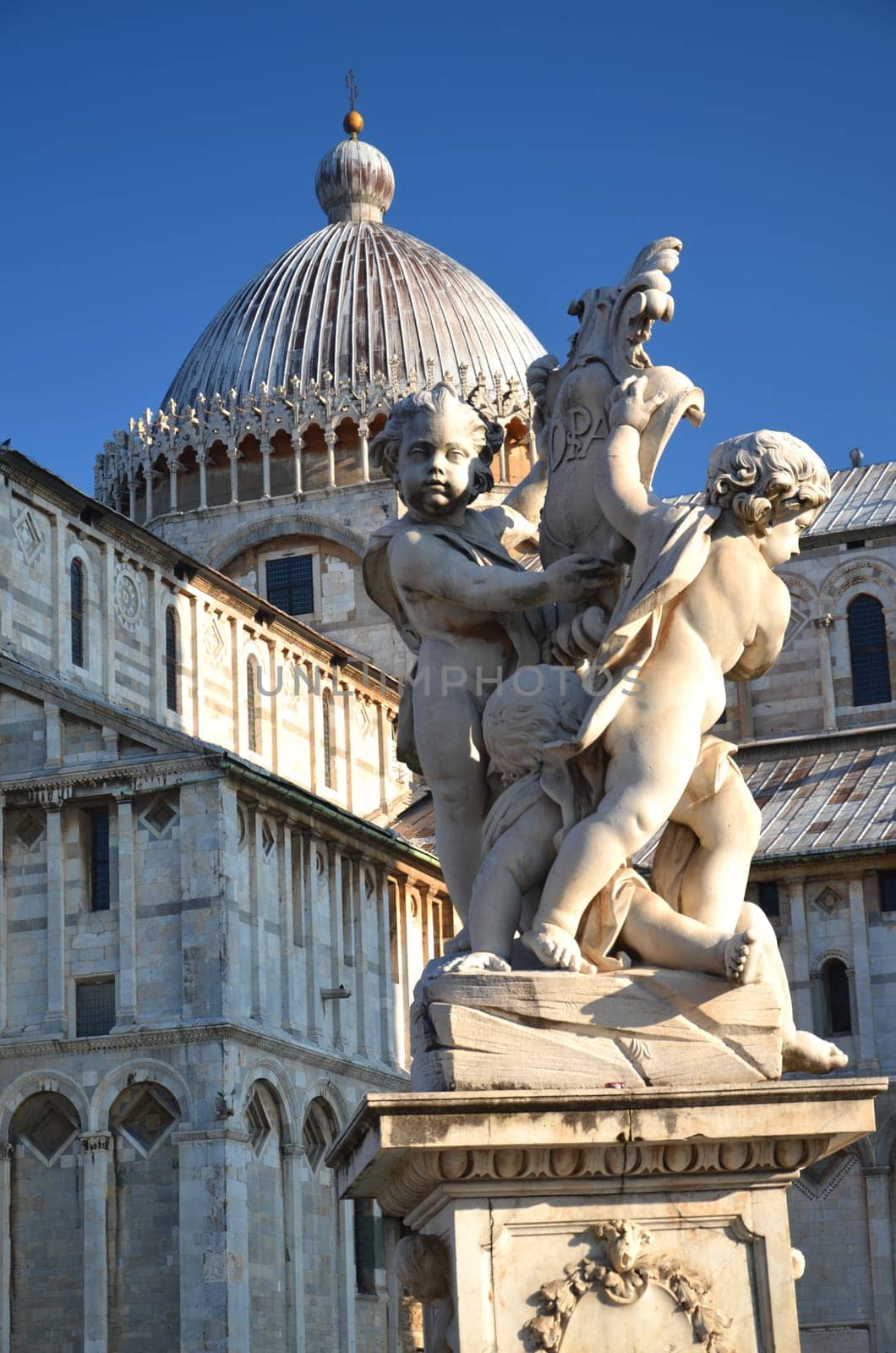 The statue of angels on Square of Miracles in Pisa, Italy
