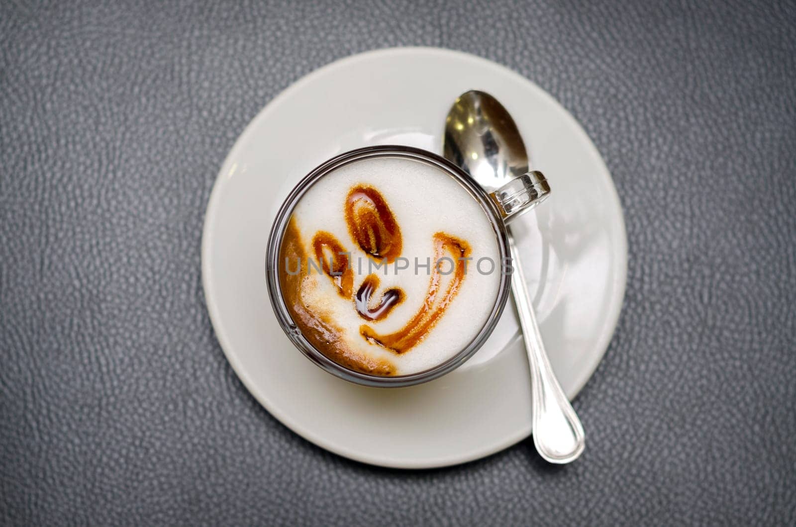 coffee decorated with a smiling face