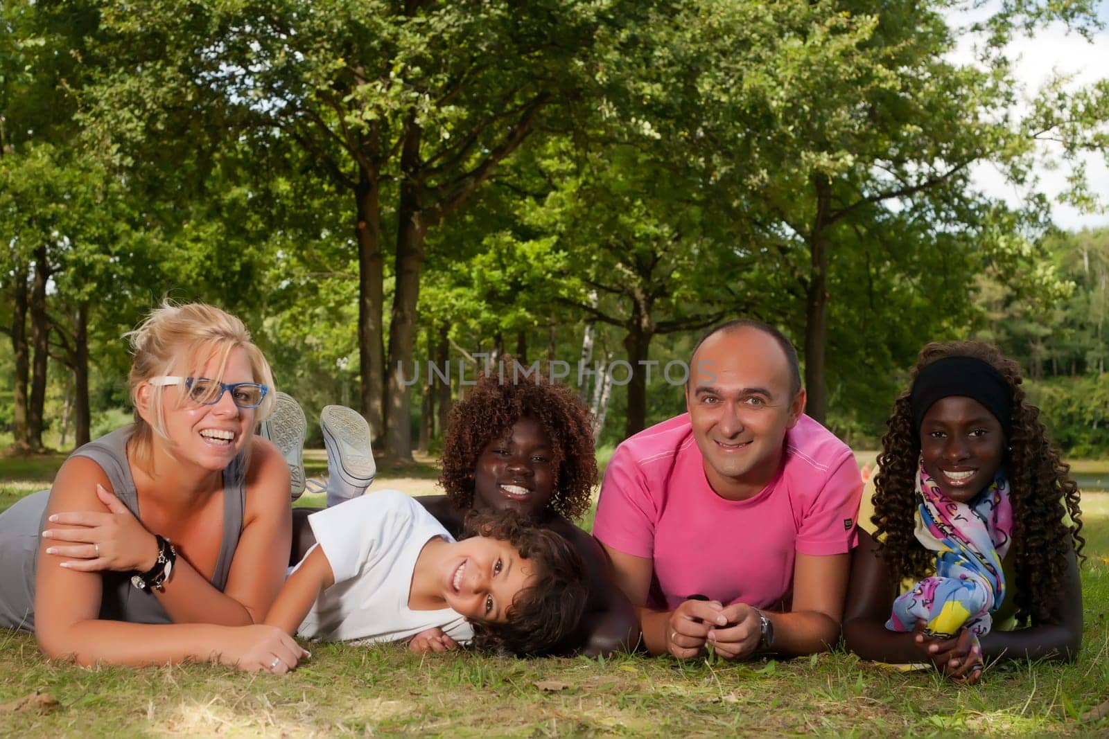 Happy multicultural family having a nice summer day