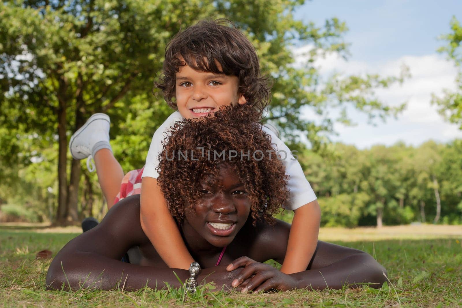 Happy african children having a nice dat at the park.